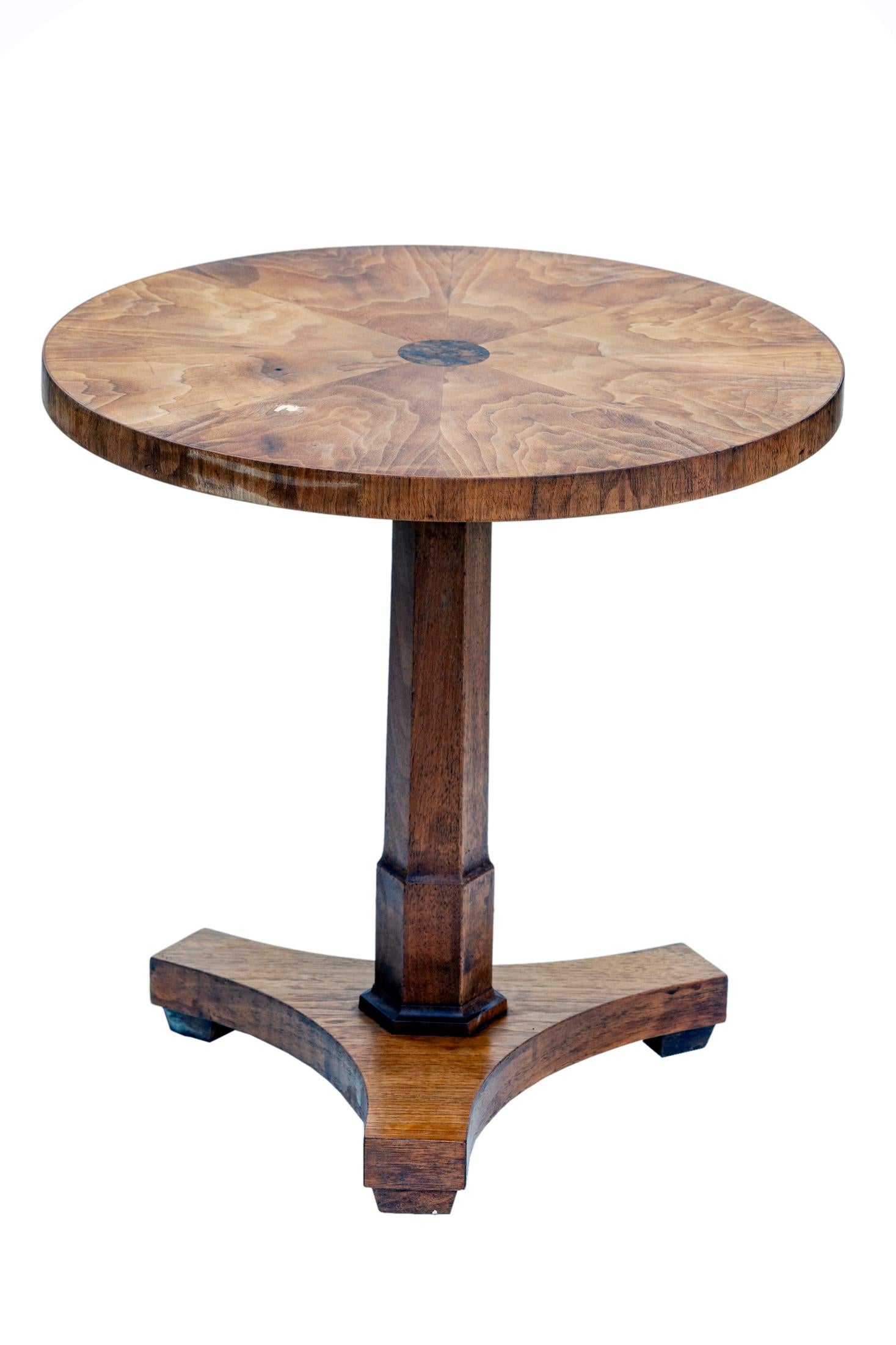 Elegant diminutive occasional /pedestal table, walnut veneers, simple center medallion. Six-sided stem sits on a base with three feet.
