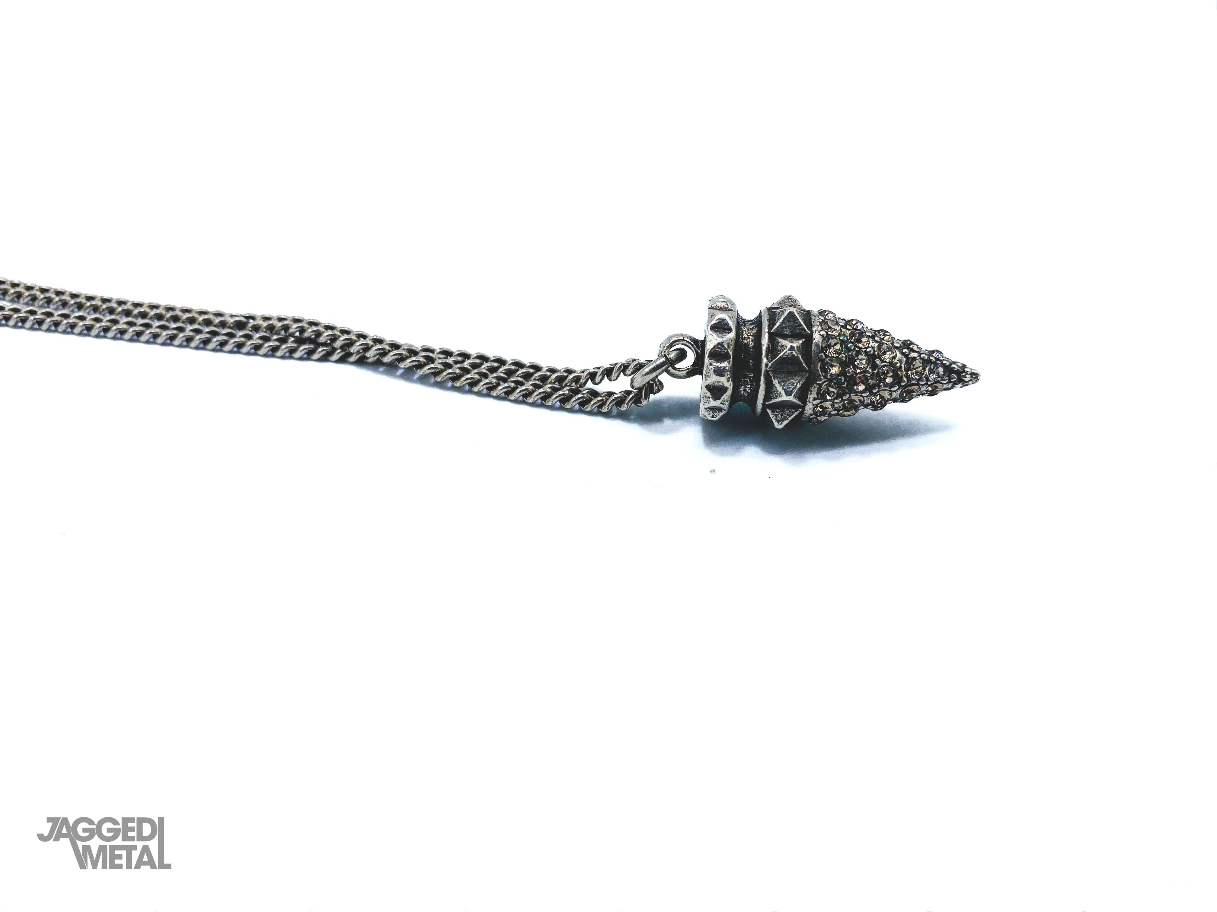 Jean Paul Gaultier Vintage 1990s Pendant Necklace 

Detail
-Crafted from silver plated metal
-Can be doubled up for a layered effect. 

Authenticity & Condition
-Fully examined and authenticated by experts. Stamped GAULTIER on the bar of the toggle