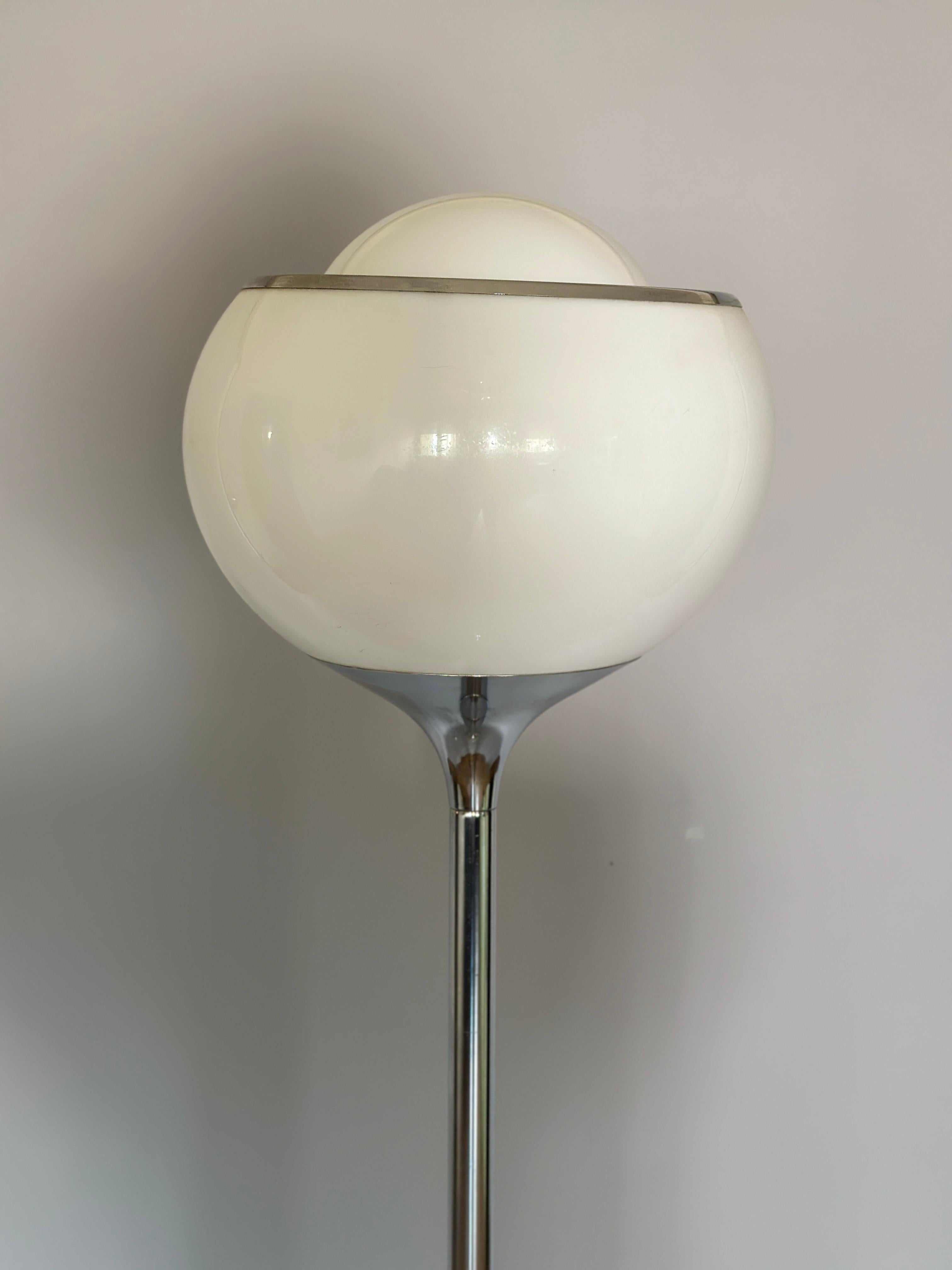 Amazing Bub floor lamp by Guzzini for Meblo.Designed in the 1968 and made in 70s.Made from plastic shade and chrome plate.