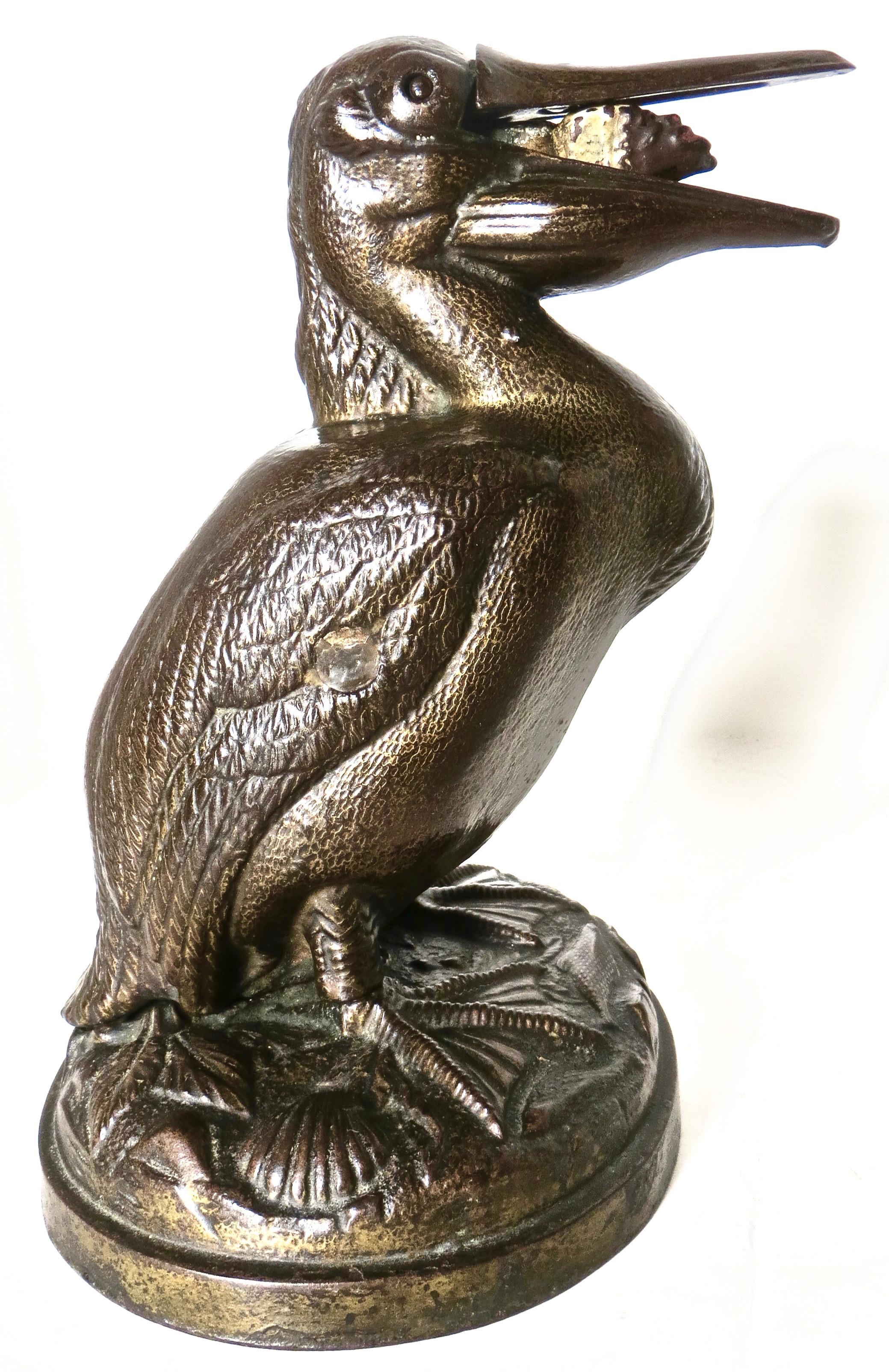 The Pelican Mechanical Bank is made of cast iron and was manufactured by The J. & E. Steven's Manufacturing Company, in Cromwell, Connecticut in 1878. It was, however, created by John Gerard of the Trenton Lock & Hardware Company in Trenton, New