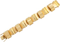 Modernistisches mechanisches, geometrisches Gelbgold-Armband