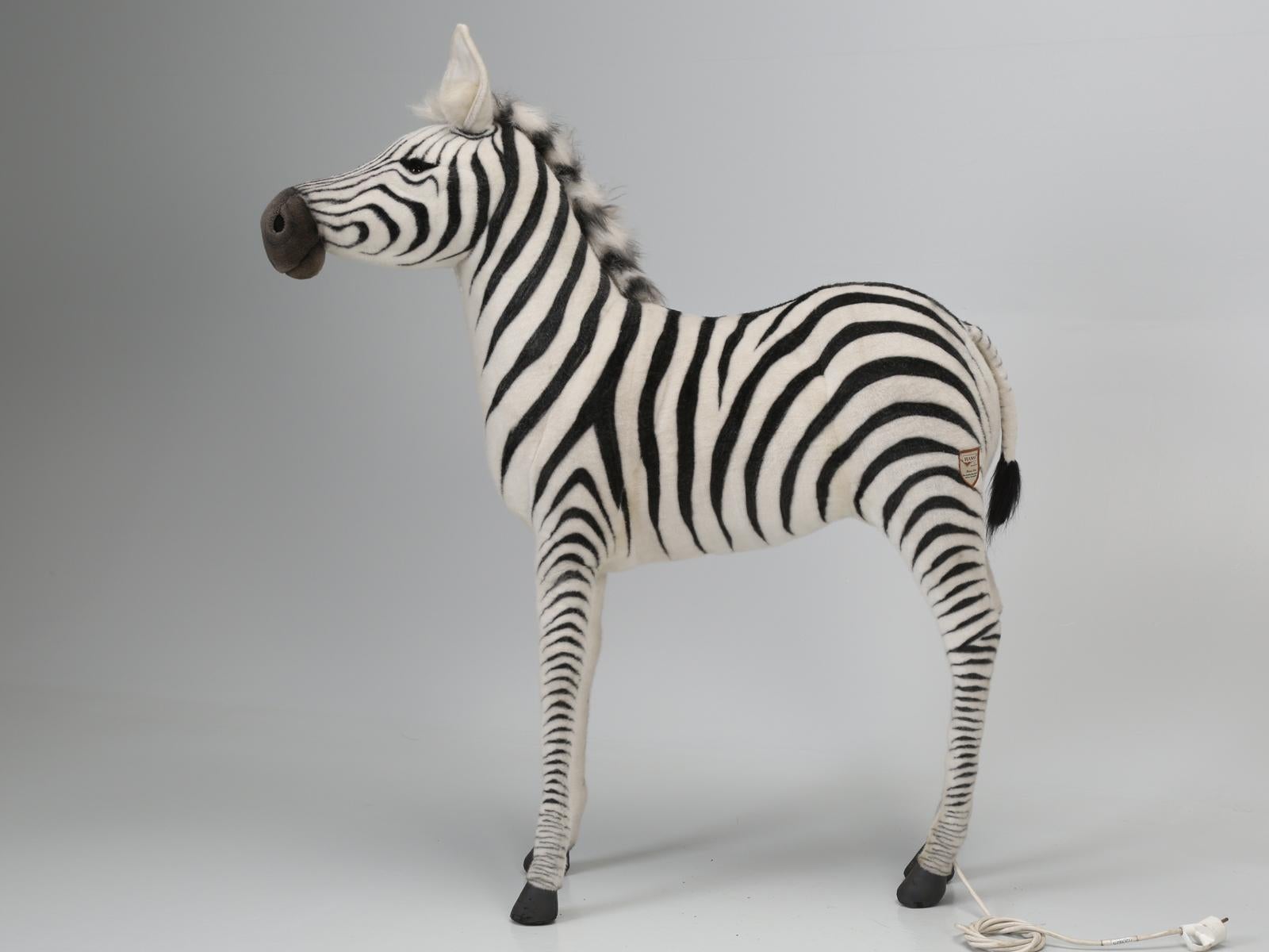 The famous stuffed animal company, Hansa, was created in 1972 by German-born Hans Axthelm. Each and every Hansa stuffed animal, is hand sewn, using the inside-out method, in order to avoid visible seams. This particular animated or mechanical Zebra