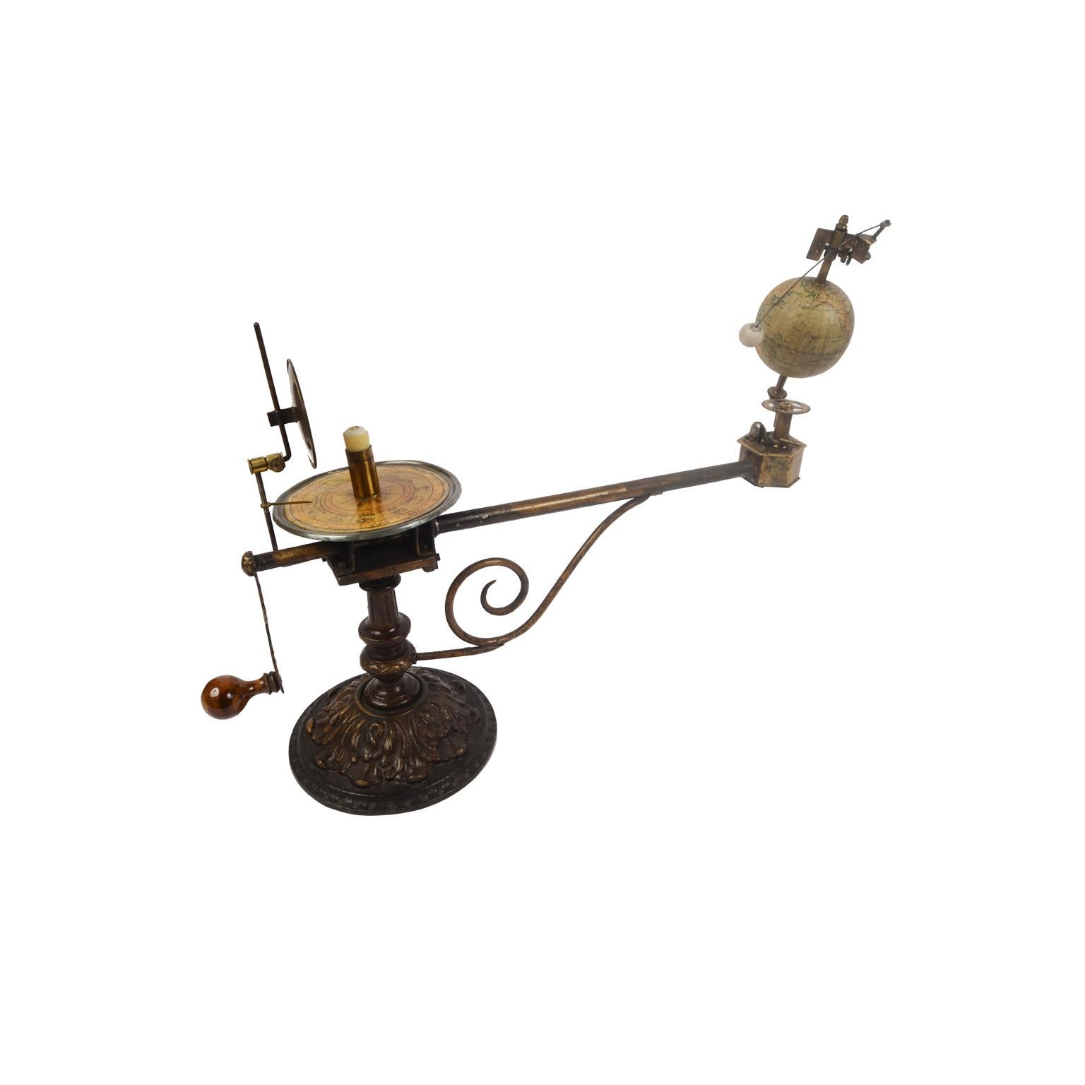 Rare orrery, or mechanical model depicting the solar system, from the second half of the 19th century. On the cartouche of the globe we read: Globus Jan Felkla Syn Roztoky Prahy. Bronze patinated cast iron structure, brass gears and terrestrial