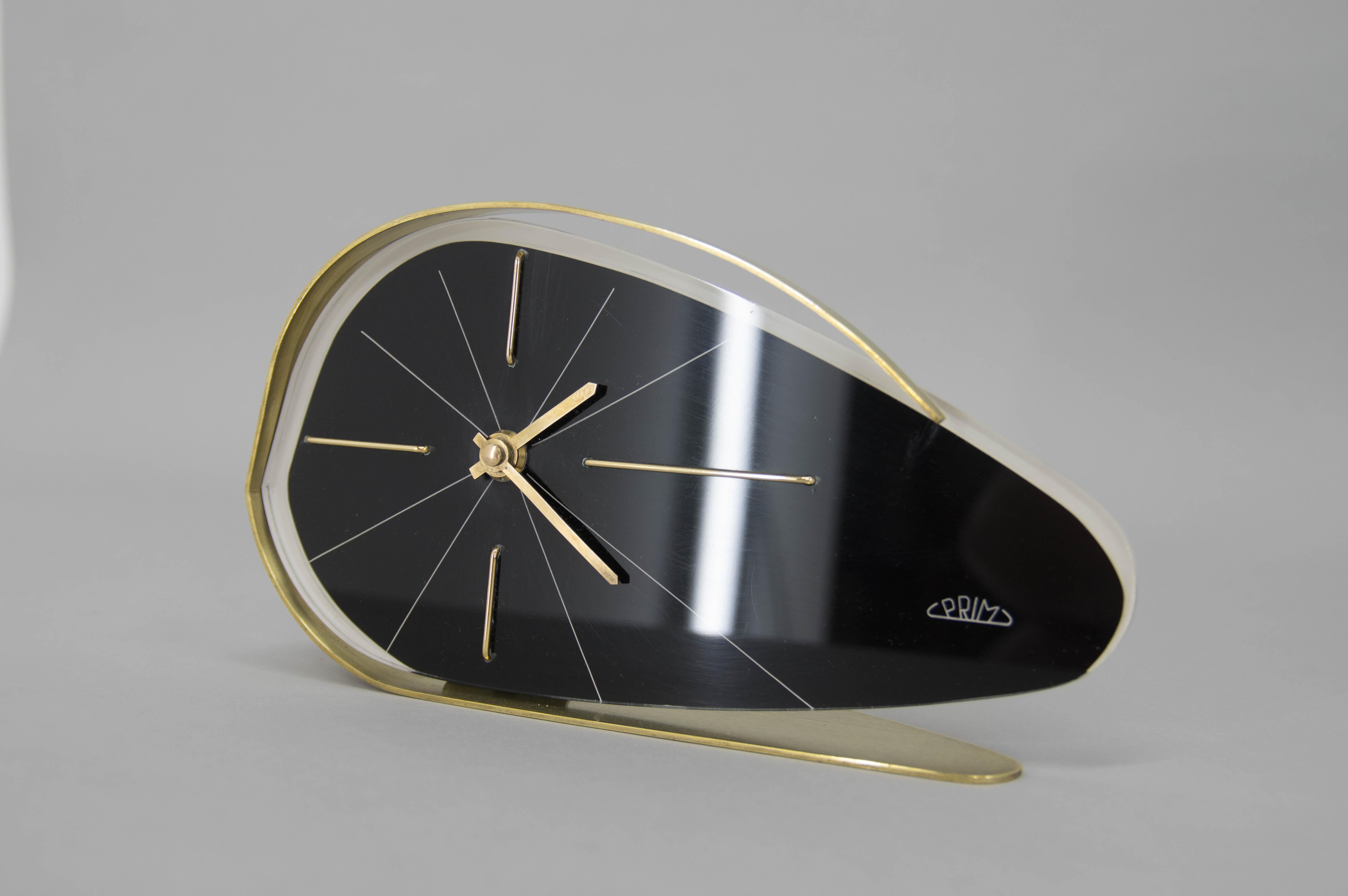 Table clock in Brussels style made in Czechoslovakia by Chronotechna Sternberk in 1960
Brass and black glass.
Very good condition,.
This piece has been serviced and it keeps time very well.
