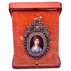 medallón con miniatura