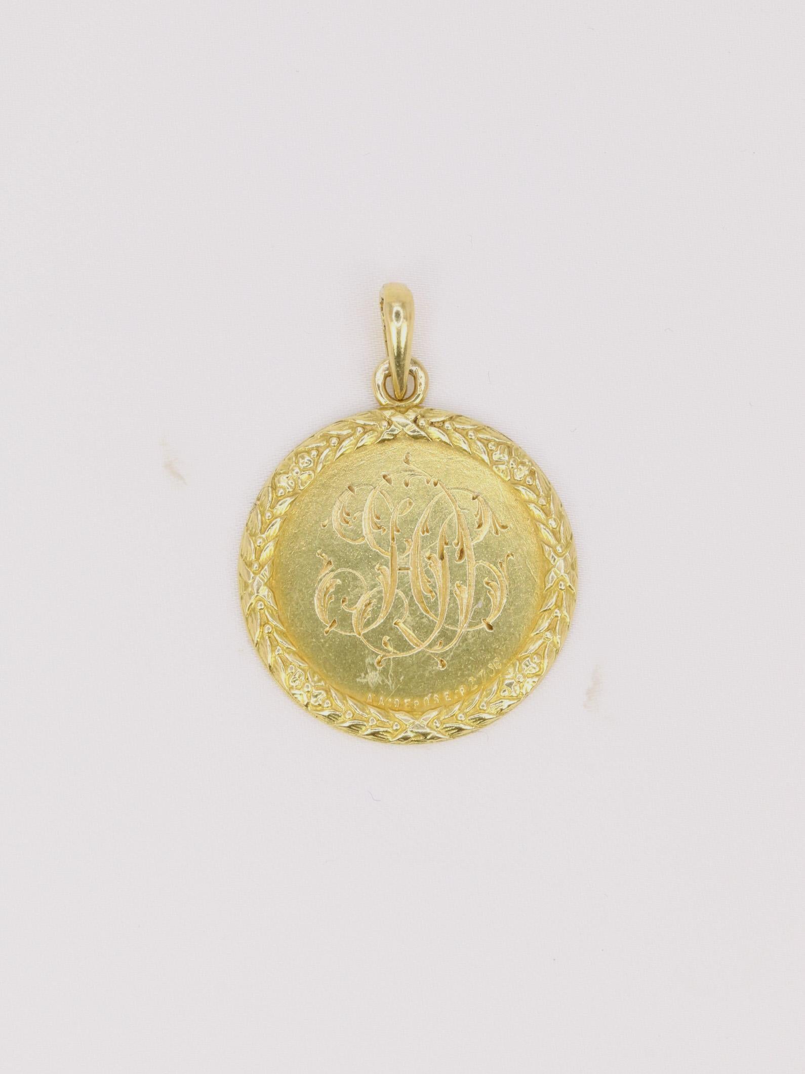 Art Nouveau Médaille amour Augis ronde en or, diamants et rubis ca. 1910
