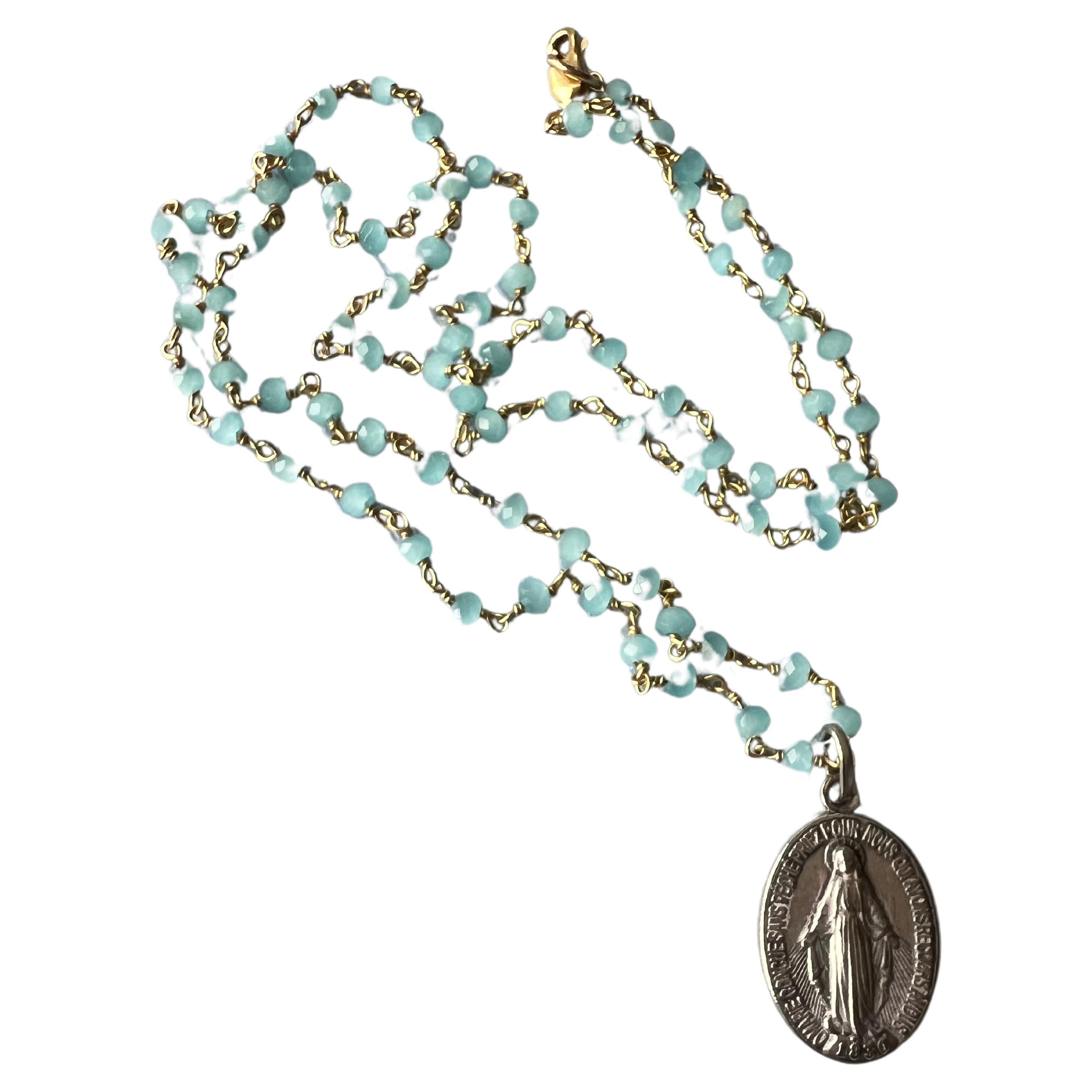 Virgin Mary Medal Necklace on a Rosario Chain with Semi Precious gem Beads in Color of Turquoise, Medal is French Vintage

64 cm

The inscription 