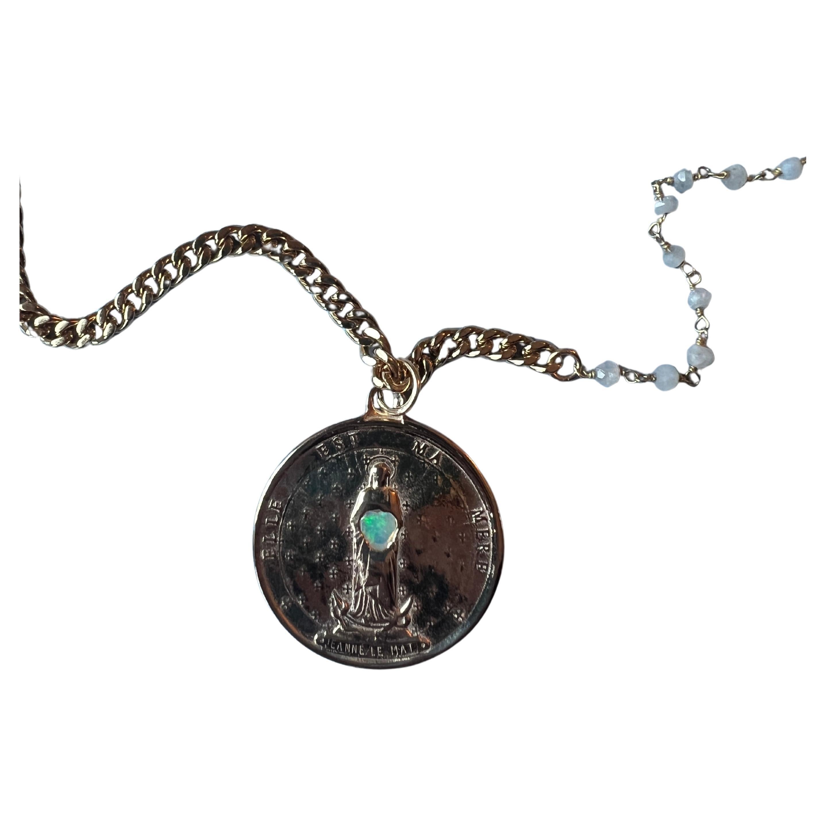 Opal Medal Necklace Chain Pearl Rosario

Designer: J Dauphin

Medal Gold Plated and Necklace Gold Plated Brass and Rosario with Pearls

Gem: Egyptian Opal
'
Exclusive piece with a Round Bronze  Medal Coin with French Saint Jeanne Le Mat and an Opal