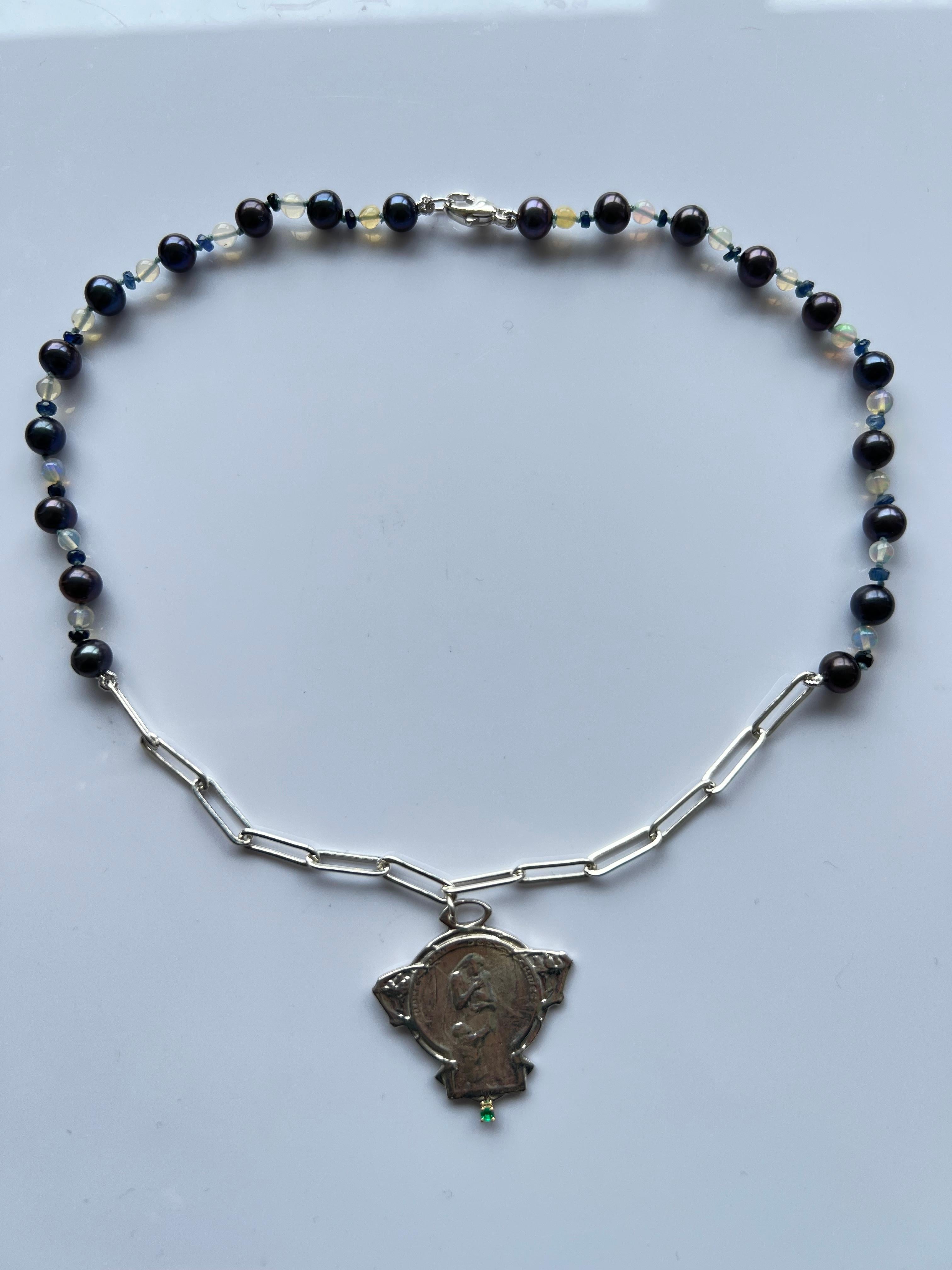 Emerald Set Medal Virgin Mary Black Pearl Opal and Blue Sapphire Choker Necklace Silver Chain  J Dauphin

Symbols or medals can become a powerful tool in our arsenal for the spiritual. 
Since ancient times spiritual pendants, religious medals has