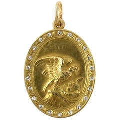 Vintage Medallic Art Company 14 Karat Yellow Gold and Diamond Mother Eagle Pendant