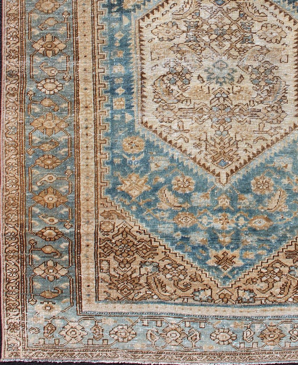 Hamedan Persian antique small rug with layered Medallions and geometric motifs in blue, brown, cream and taupe, rug sk-7569, country of origin / type: Iran / Hamedan, circa 1910.

This magnificent antique Hamedan features beautiful coloration,