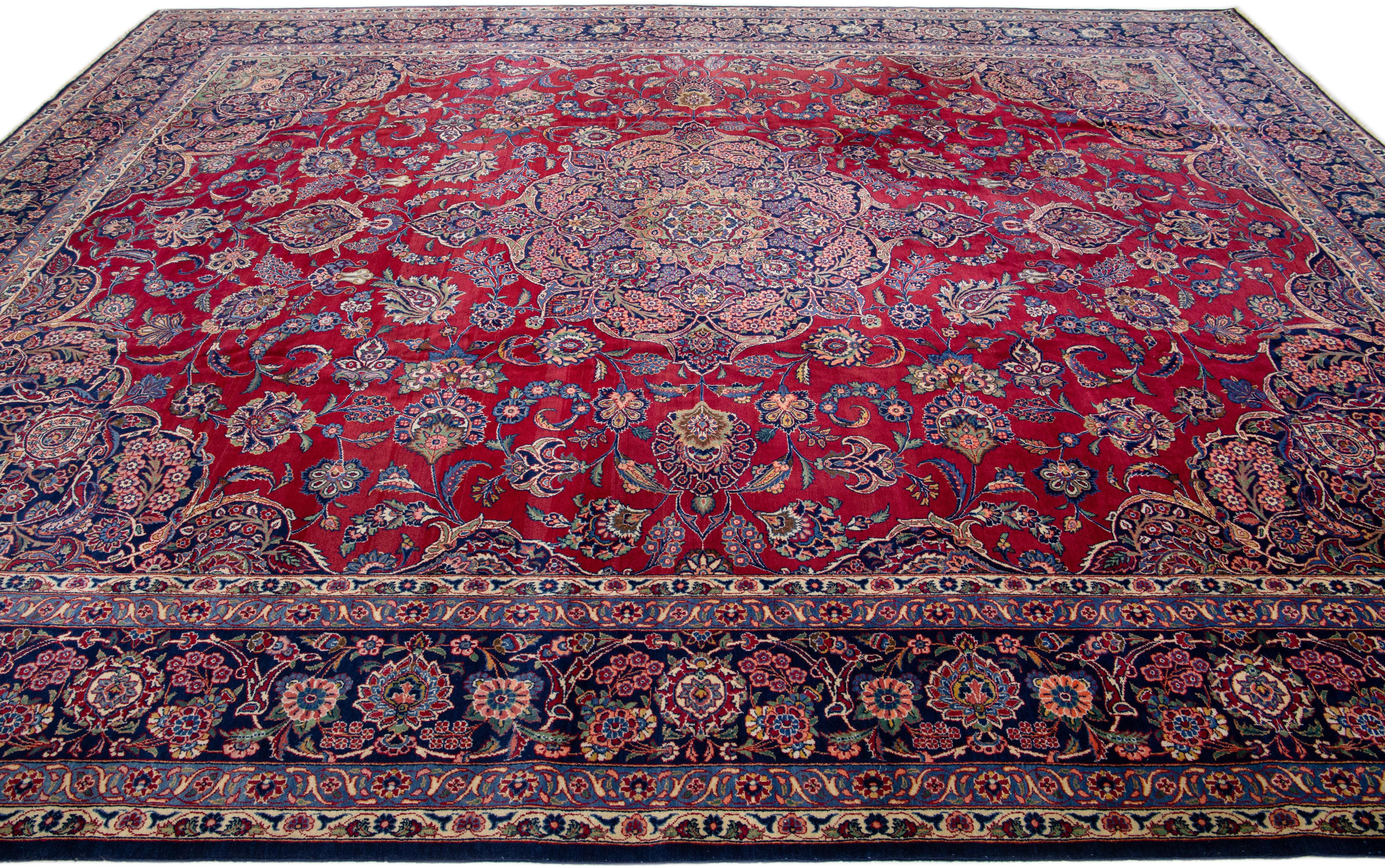 Medallion Antique Persian Kashan Handmade Wool Rug in Red In Good Condition For Sale In Norwalk, CT