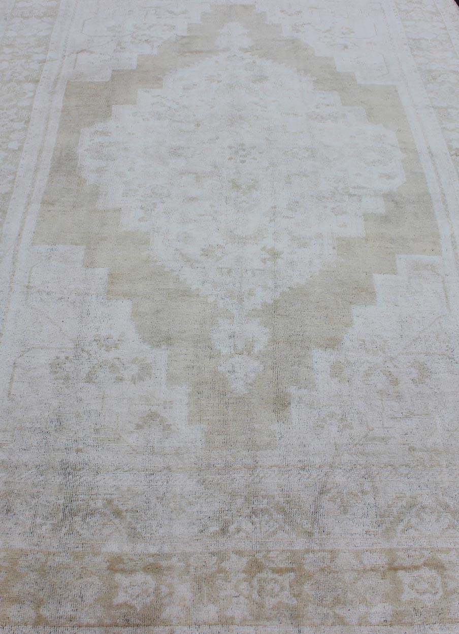Medallion Design Vintage Oushak Rug in Muted Tones of Faded Yellow and Neutrals For Sale 6