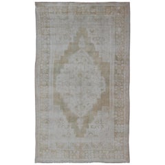 Medallion Design Vintage Oushak Rug in Muted Tones of Faded Yellow and Neutrals