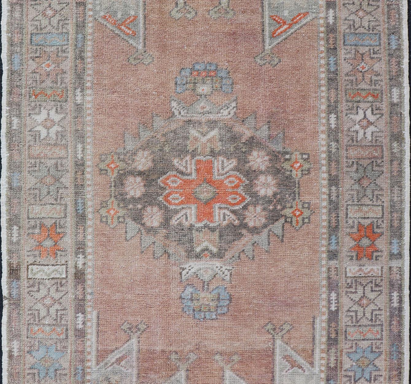 Hand-Knotted Medallion Design Vintage Turkish Oushak Rug with Salmon and Pops of Orange For Sale