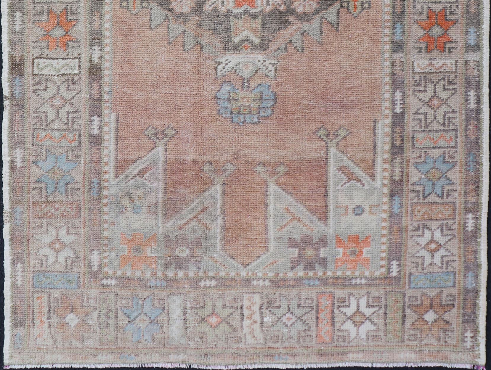 Medallion Design Vintage Turkish Oushak Rug with Salmon and Pops of Orange In Good Condition For Sale In Atlanta, GA