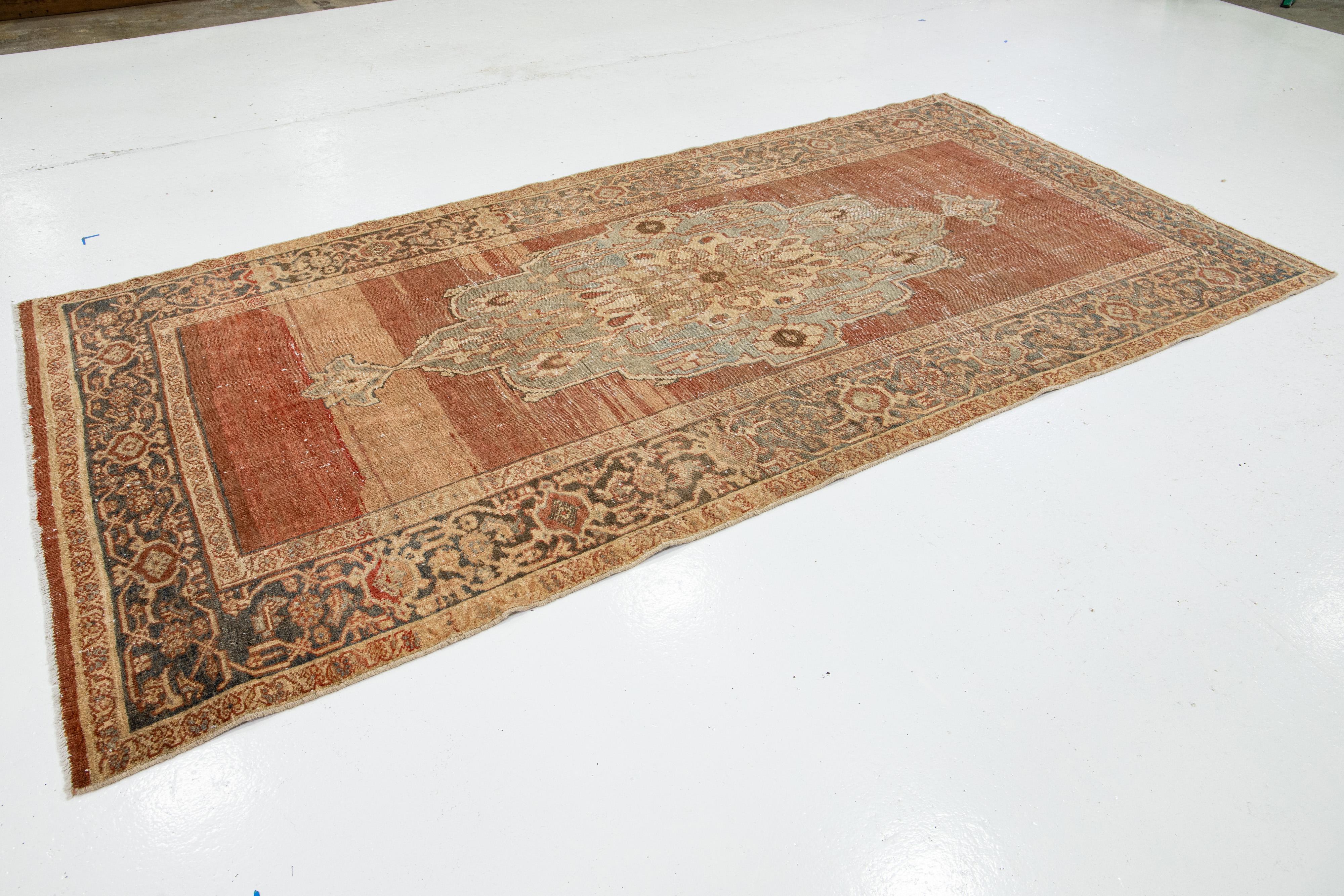 Hand-Knotted Medallion Designed Antique Mahal Wool Rug In Rust Color For Sale