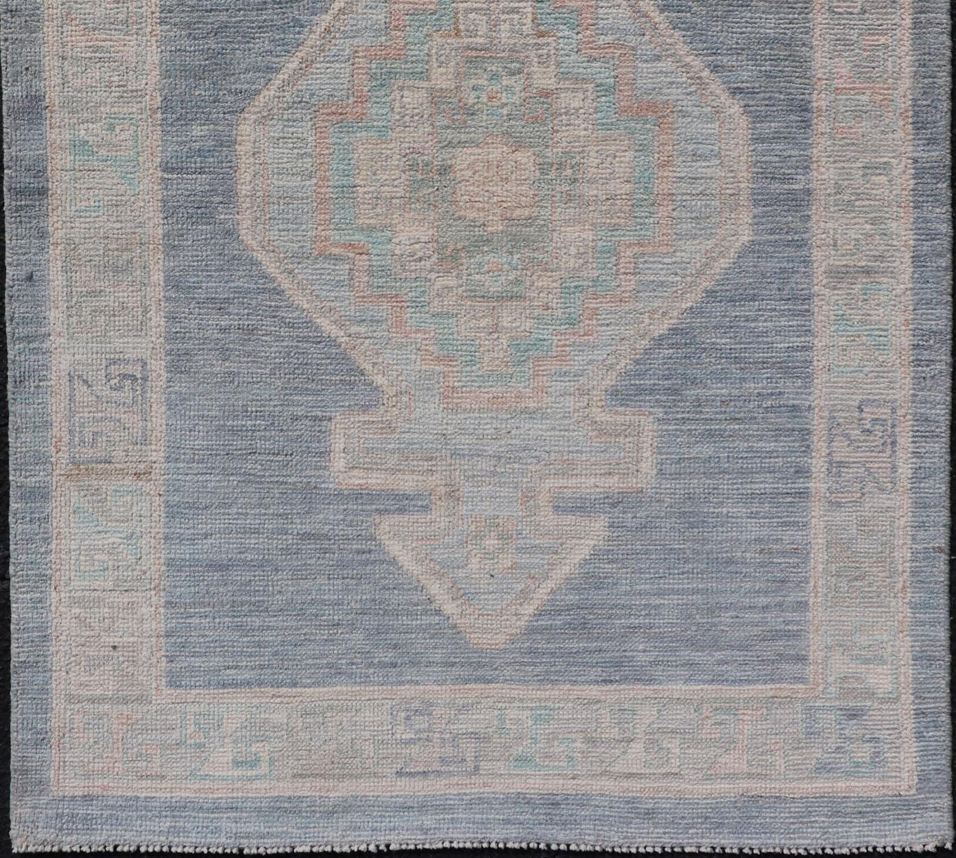 Afghan Medallion Designed Modern Oushak with Blue Background and Cream Border For Sale