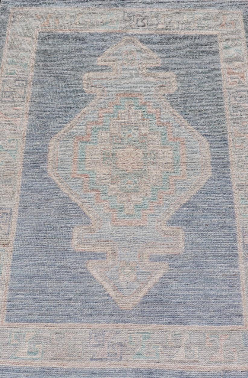 Hand-Knotted Medallion Designed Modern Oushak with Blue Background and Cream Border For Sale