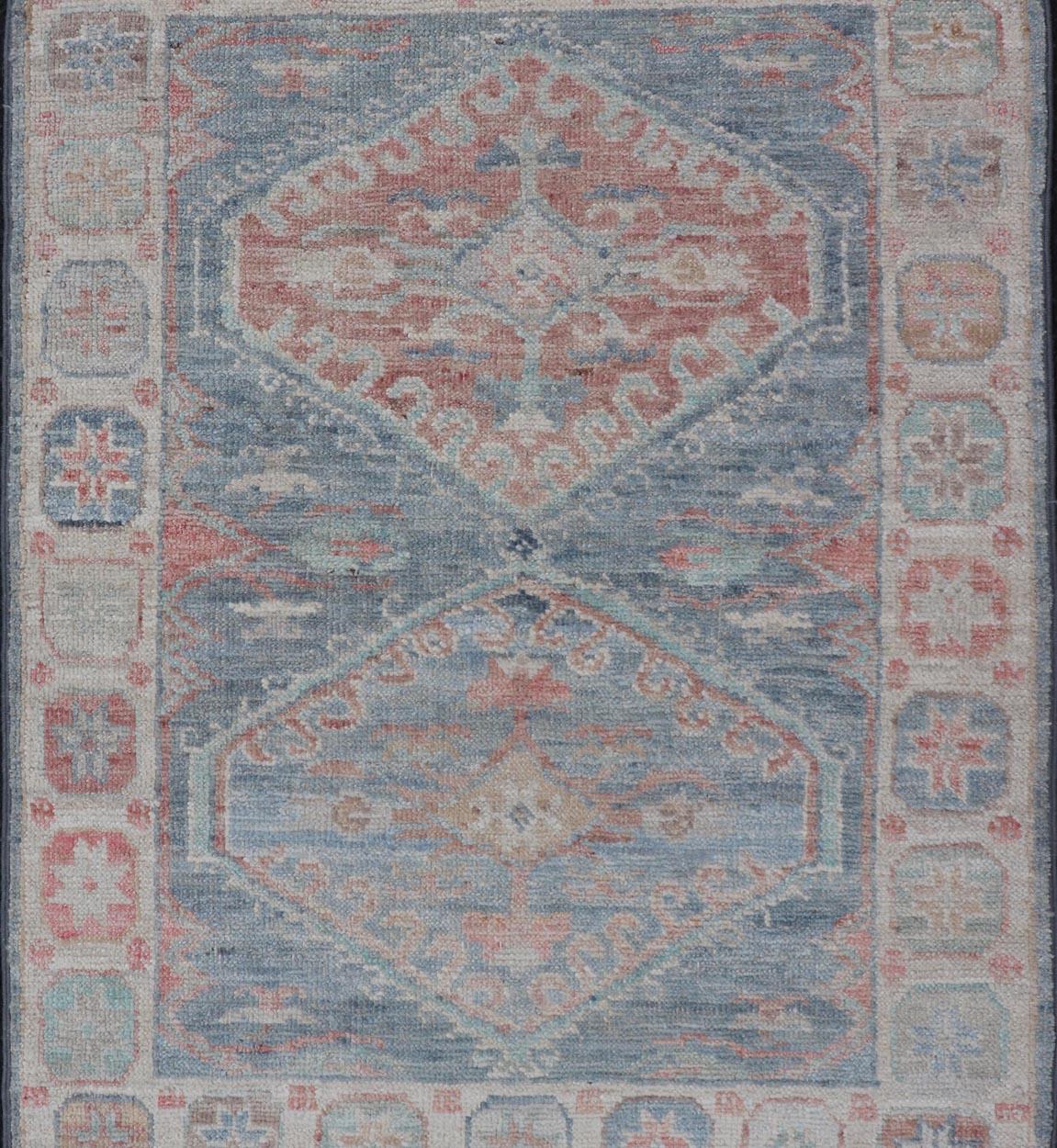 Medallion Designed Modern Oushak with Light Blue Background and Cream Border In New Condition For Sale In Atlanta, GA