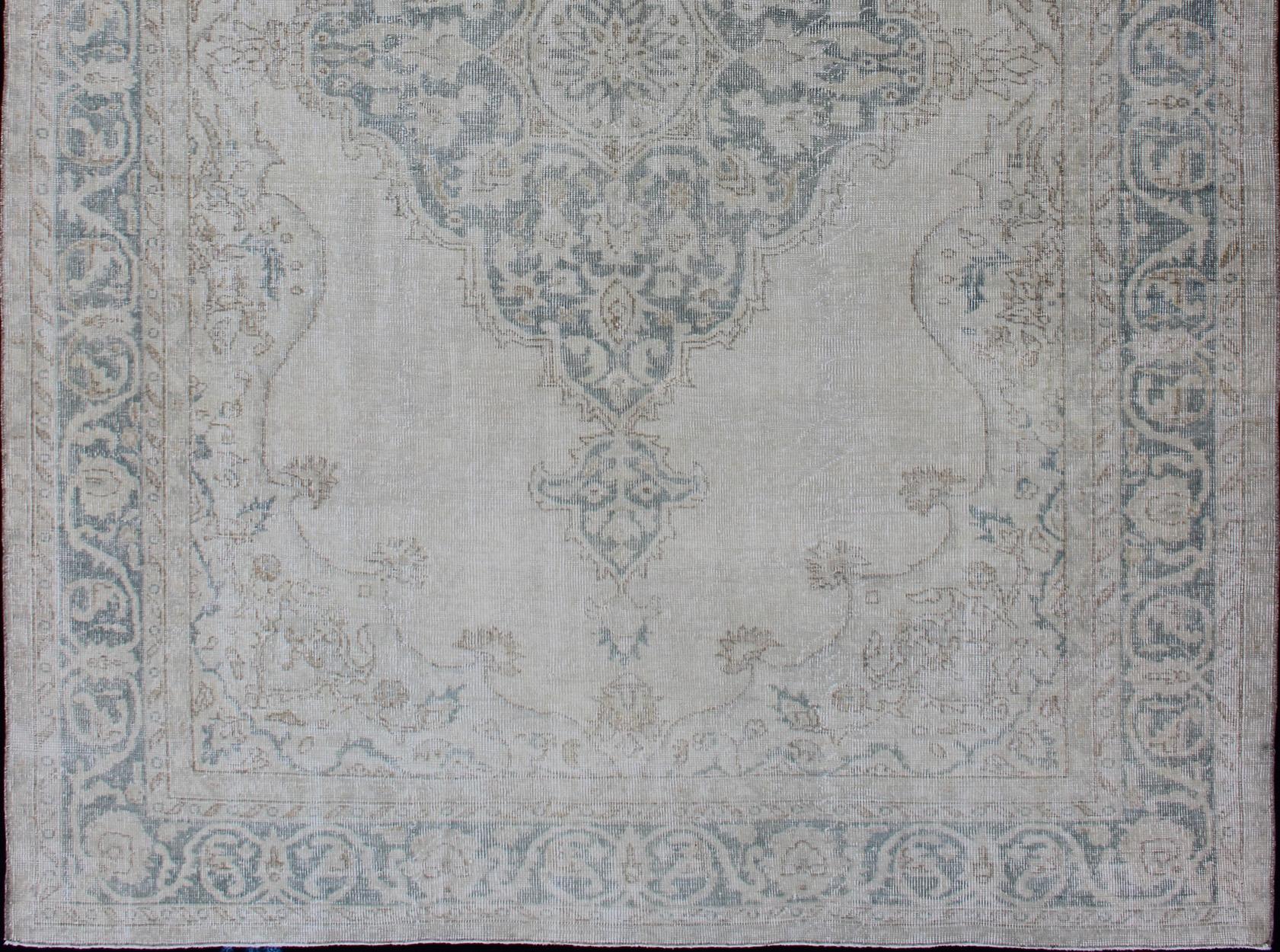 Hand-Knotted Medallion Distressed Oushak Turkey in Cream, Blue Tones, brown and Teal Blue For Sale