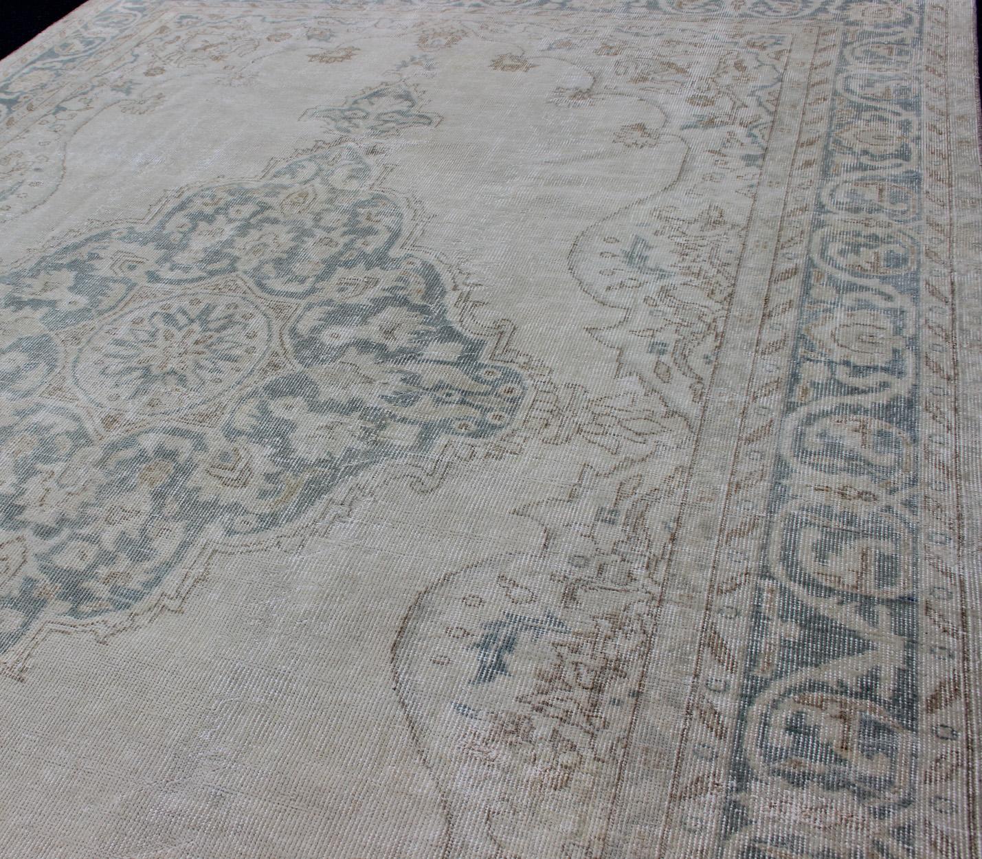 20th Century Medallion Distressed Oushak Turkey in Cream, Blue Tones, brown and Teal Blue For Sale