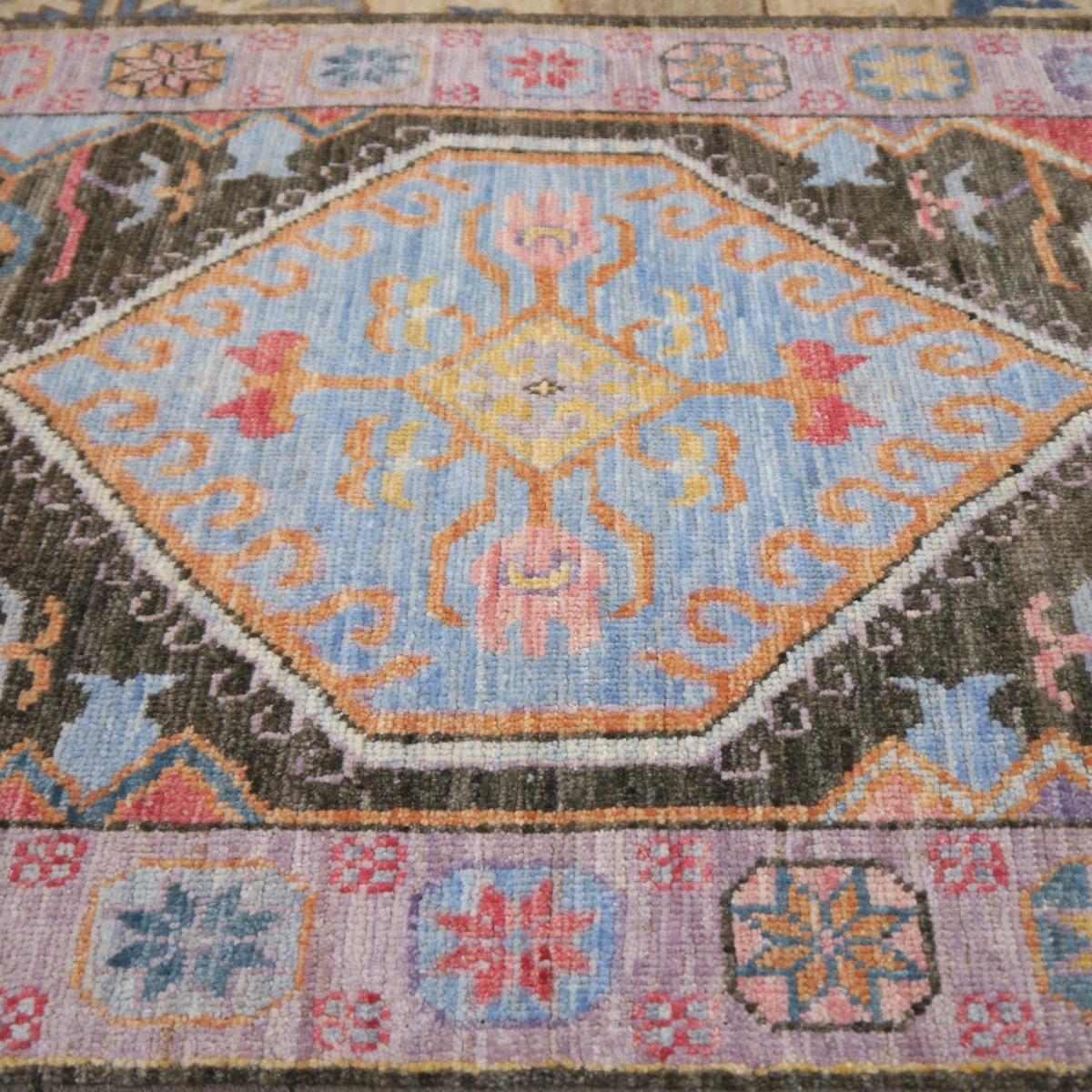 Stunning stair or hallway runner wool rug, hand-knotted in Afghanistan.

Oushak design rugs and carpets are mainly made of fine, hand-spun wool, 
This wonderful and stunning example comes from Afghanistan.

This rug was made in a village close