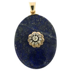 Pendentif médaillon en or et argent 14 carats serti de lapis-lazuli et de diamants