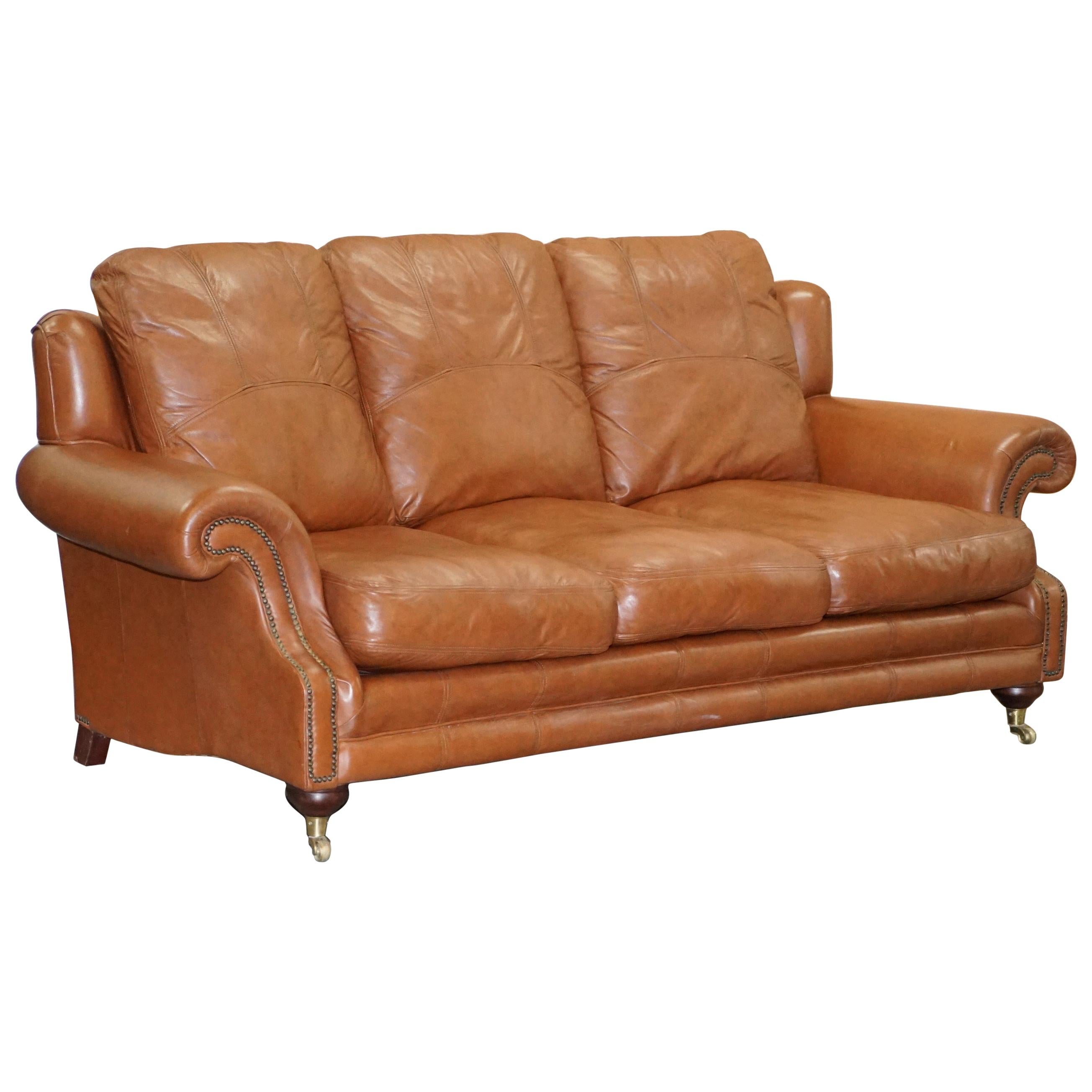 Medallion Upholstery Brown Leather Three-Seat Sofa Part of Large Suite
