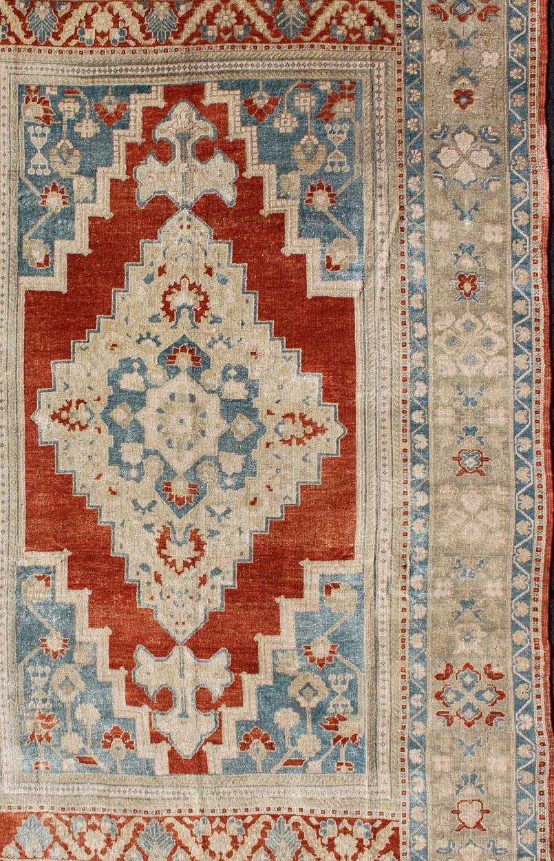 Gorgeous vintage Turkish Oushak in beautiful red, blue, light green and cream rug/TU-MTU-4920, country of origin / type: Turkey / Oushak, circa 1940.

This beautiful vintage Oushak rug from 1940s Turkey features a Classic Oushak design, which is