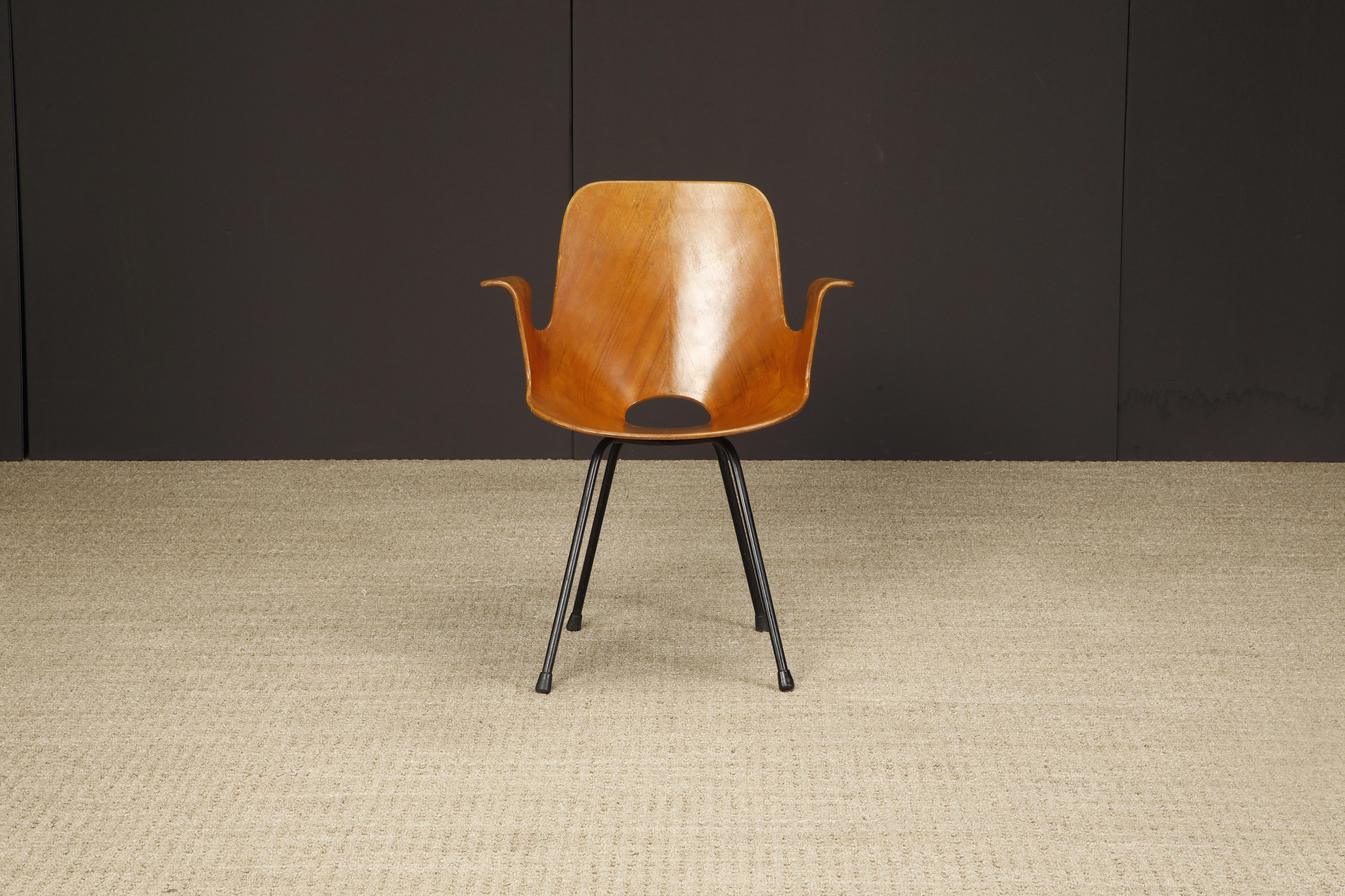 This fantastic collectors sculptural bentwood armchair is the 'Medea 102' chair by Vittorio Nobili for Fratelli Tagliabue and was crafted in Italy circa 1955, signed underneath with Medea insignia. Perfect for collectors looking for a unique and