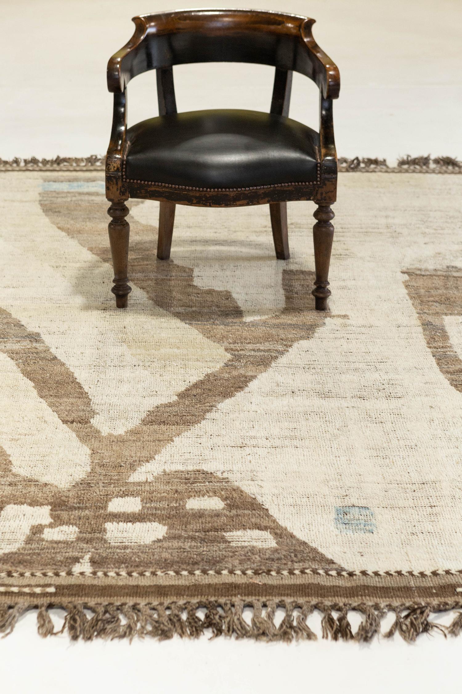 'Meden' is an earth-toned natural wool rug and a modern interpretation of the Moroccan world. This rugs irregular shapes and colors resemble the fibers of nature and their ability to be used for crafts such as cords and basketry. Designed in Los