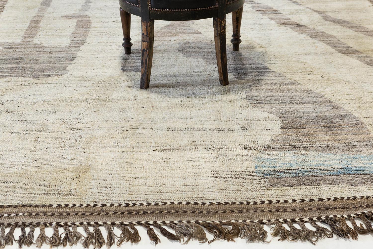 'Meden' is an earth-toned natural wool rug and a modern interpretation of the Moroccan world. This rugs irregular shapes and colors resemble the fibers of nature and their ability to be used for crafts such as cords and basketry. Designed in Los