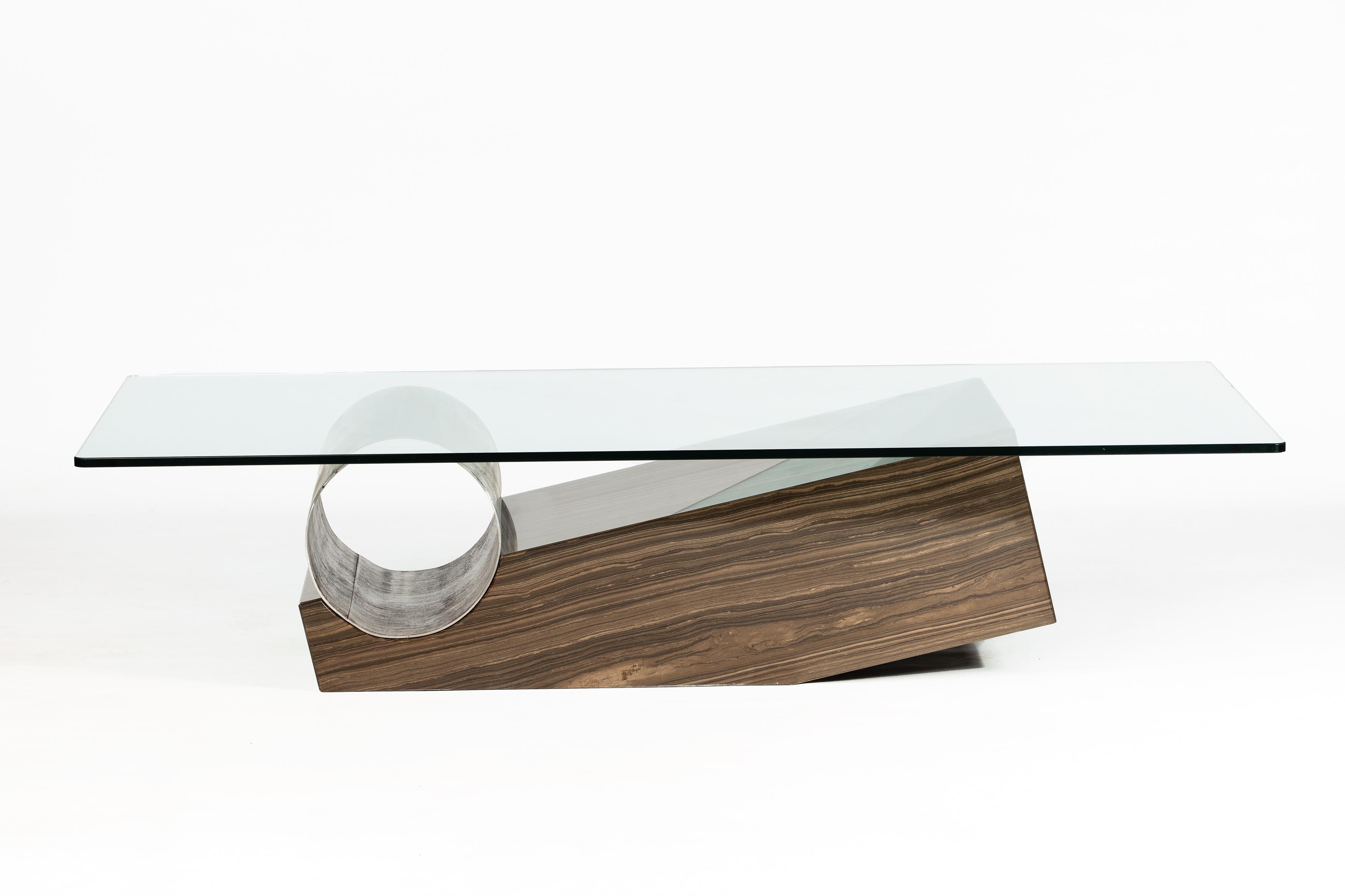 Medes Coffee is a designer coffee table with a combination of three materials: Wenge marble, devastated iron and glass. The combination of these three materials is the hallmark of designer Joaquín Moll, who seeks excellent conversations between