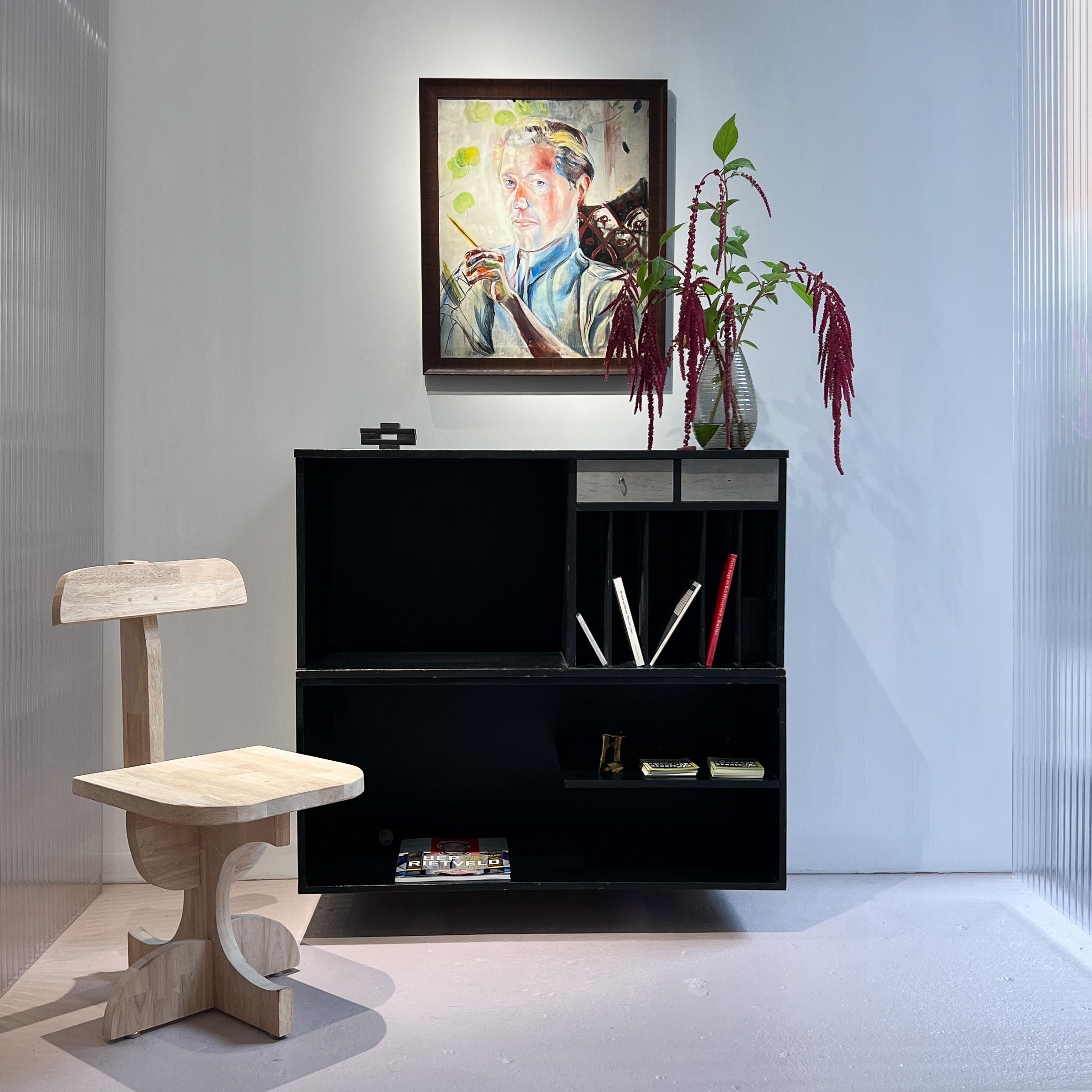 Jan Cornelius Rietveld’s *Media Cabinet* (1956) is a 46.5 x 102 x 45 cm painted plywood piece embodying modernist functionality and simplicity. Featuring an open storage section, divided compartments for media, and two minimalist drawers, its clean