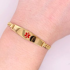 Pulsera de alerta médica Cadena de oro amarillo de 14 quilates con caduceo médico de esmalte rojo
