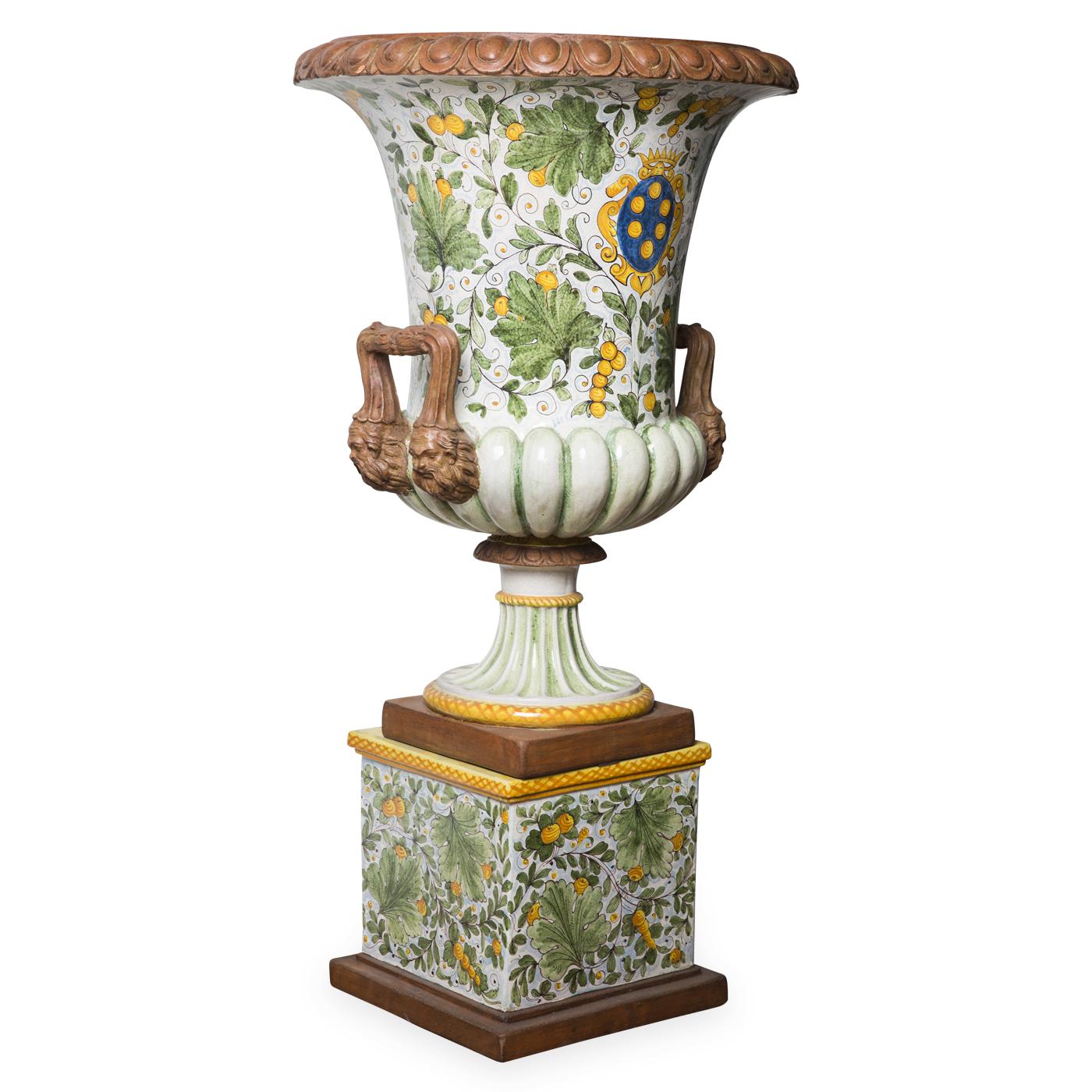 This large ceramic vase is inspired by those that the Medici, Florence's ruling family during the Renaissance, used to put in their gardens and courtyards and, indeed, their coat of arms is painted at the very center among the painted foliage. The