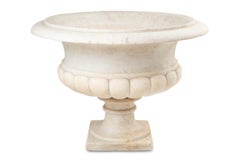 Medicis marble vase with gaudronnée body and flared neck. Circa 1880