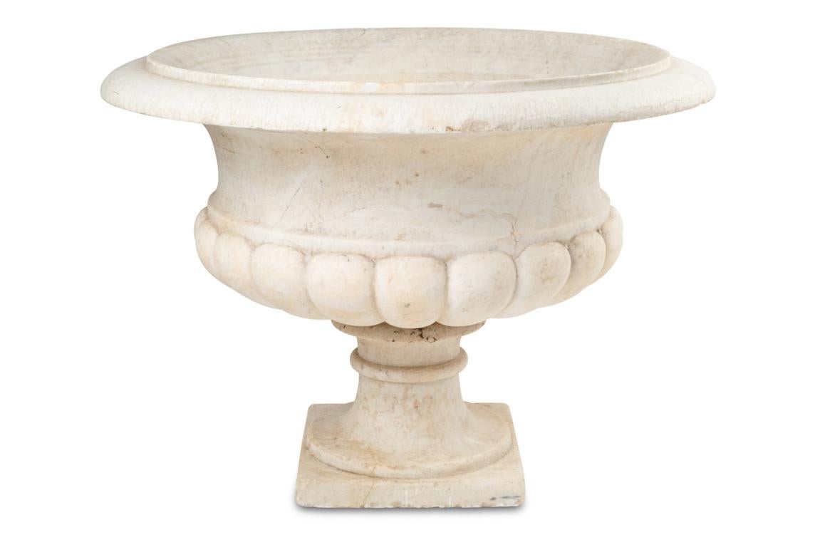 Carved Medicis marble vase with gaudronnée body and flared neck. Circa 1880 For Sale