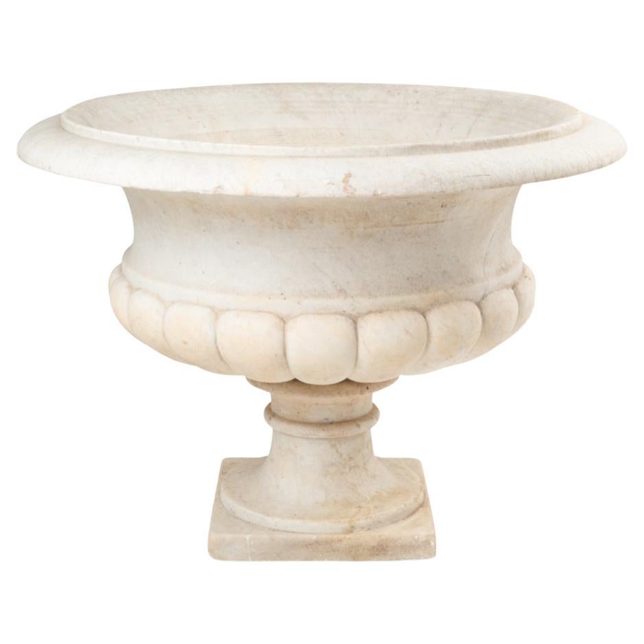 Medicis marble vase with gaudronnée body and flared neck. Circa 1880