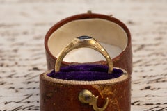 Medieval 14th-15th Century Gold and Sapphire Engraved Amuletic Stirrup Ring