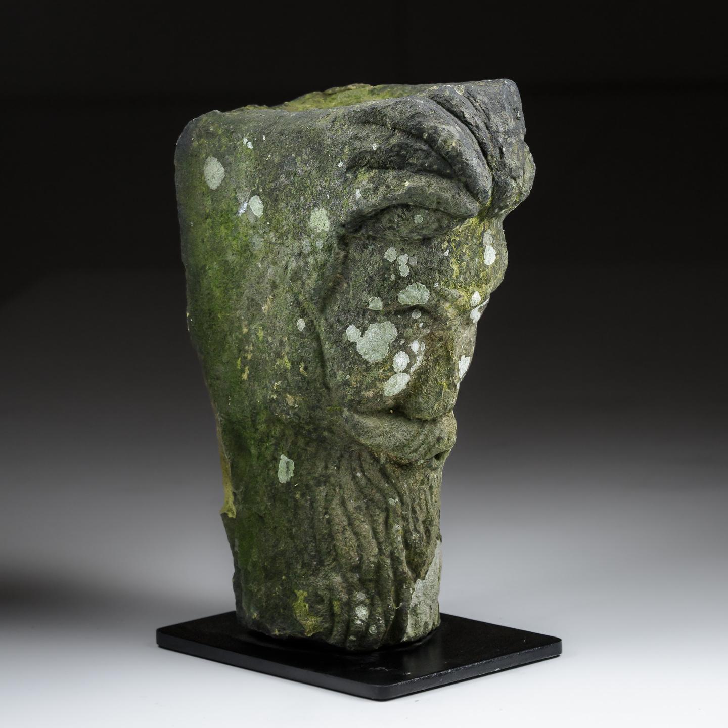 Highly unusual carved stone head of a bearded face with strong defined features. unusual 