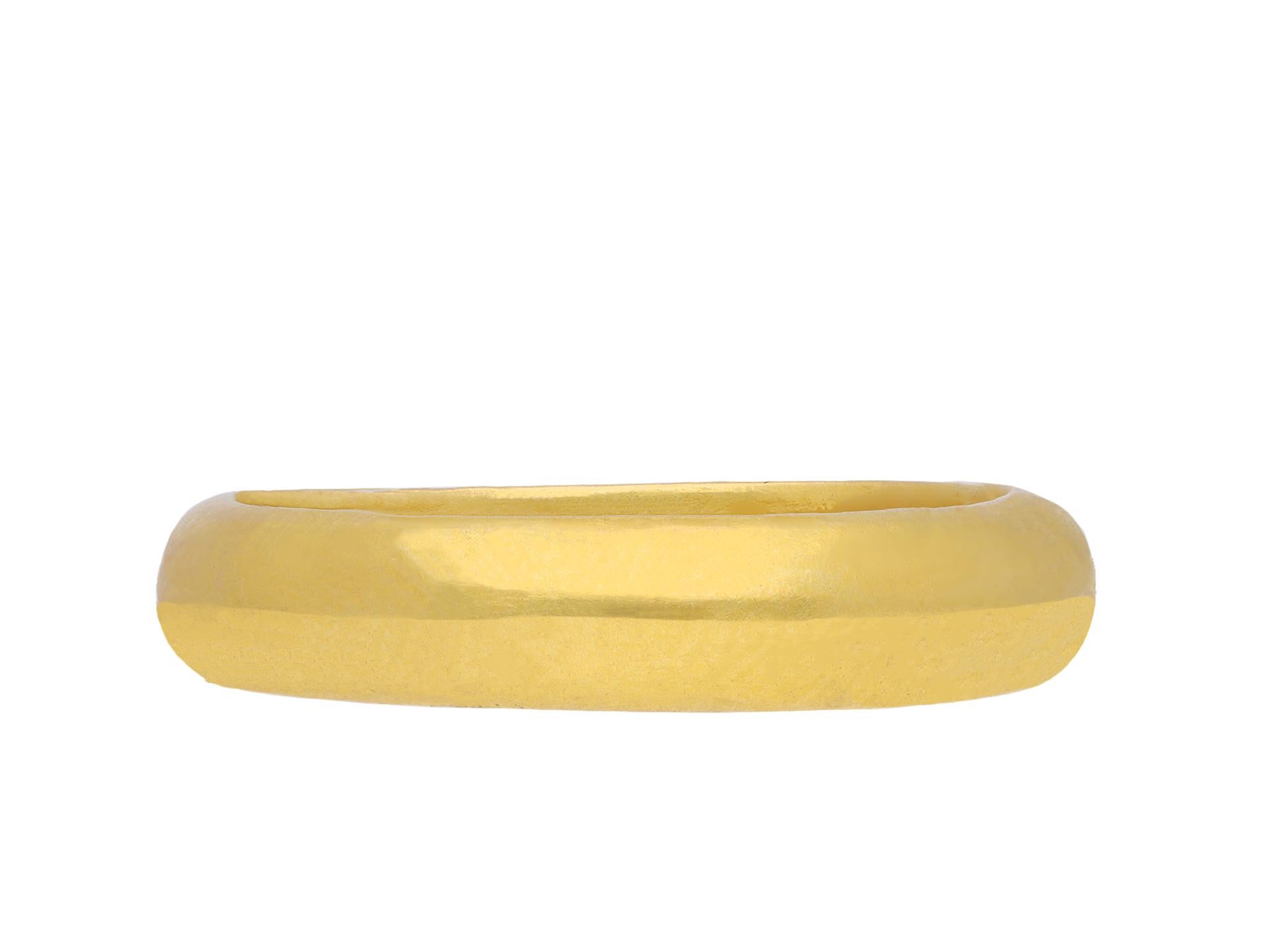 Post medieval gold posy ring. A smoothly conforming yellow gold D-shape band, engraved to the interior in italic script 'Love is the bond of peace', approximately 4.7mm in width and 2.4mm thick. Tested yellow gold, approximately 7.81 grams in