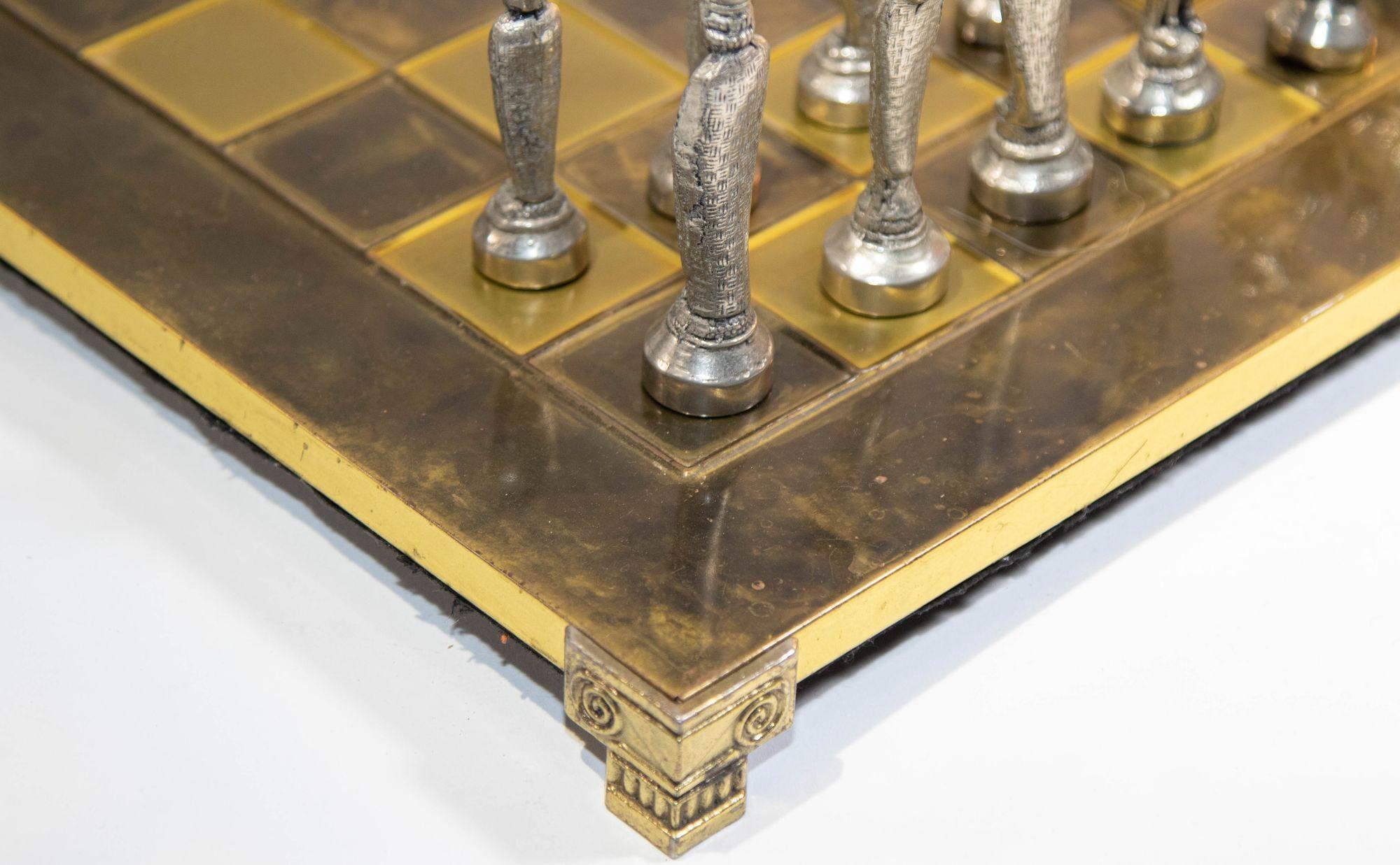Medieval Knights Chess Set - Metal Brass & Silver Nickel Plated Crusaders Game.Made in Florence, Italy, this stunning chess set features intricately cast metal pieces in antiqued silver and brass, set on a two-tone chessboard.
Details:
* Chess Set: