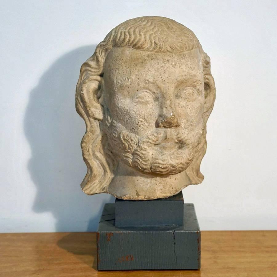 Medieval limestone bust
Limestone bust on a Douglas fir stained two-tier base. Artist unknown
circa 1450.
Measures: Sculpture only 12.5 x 14 x 11
Base only 4.5 x 7.

 