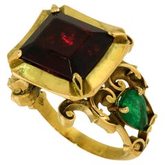 Medieval Royalty Ring in 18Kt Yellow Gold with Garnet, Emeralds, & Black Enamel