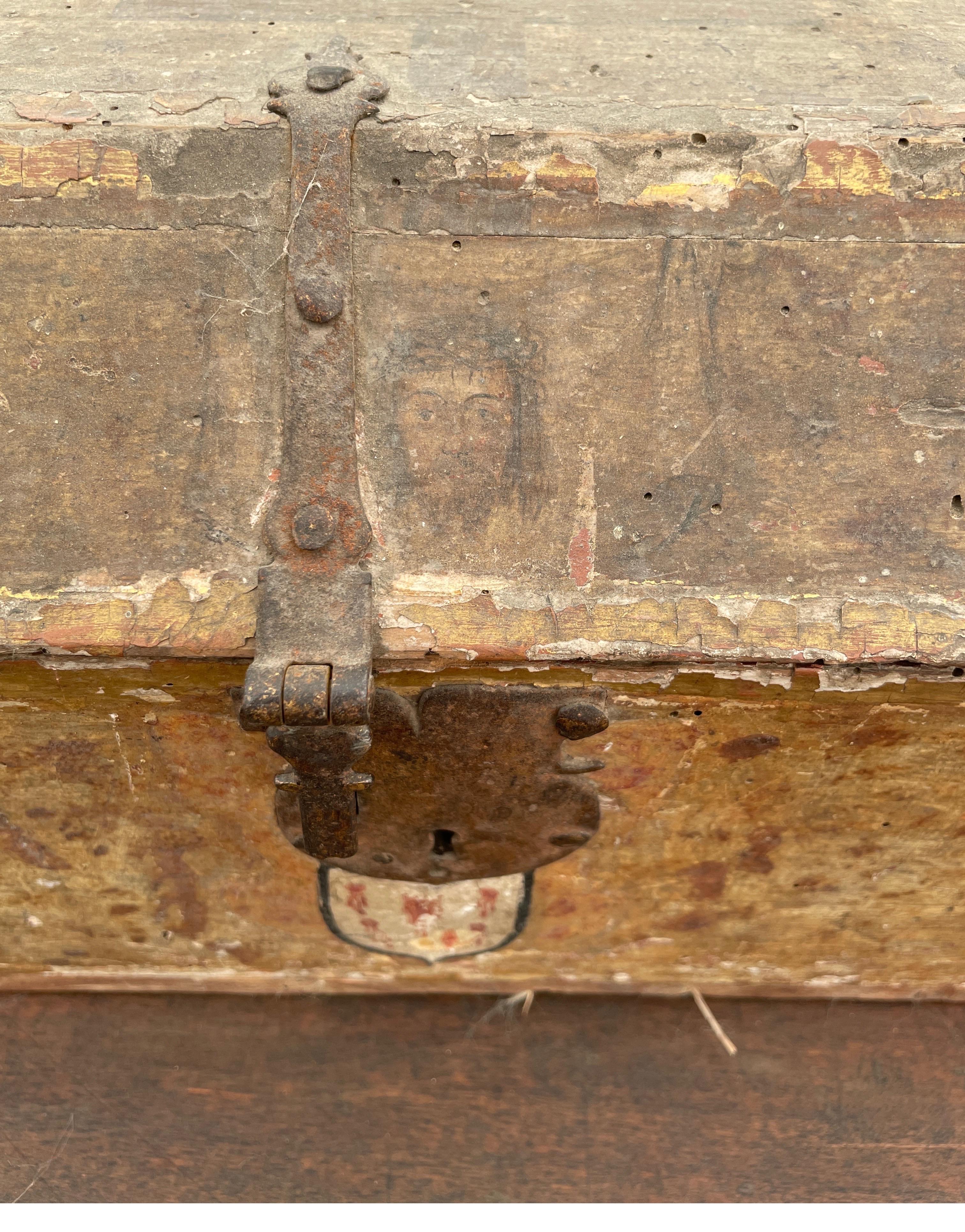 This 15th century box used to store a sword has the original iron and hand painting throughout. The lining is a purple damask. It’s lovely as an art piece on a buffet or table. Measures: 45.75 W x 7 D x 7.5 T.
