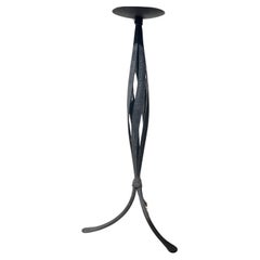 Medieval Spanish revival wrought iron floor candlestick, 20th century