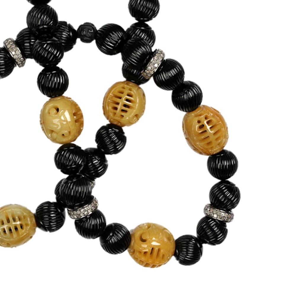Introducing a stunning Medieval Style Carved Jade & Onyx Beaded Necklace With Diamond Spacer, perfect for those looking for a one-of-a-kind piece that exudes elegance and