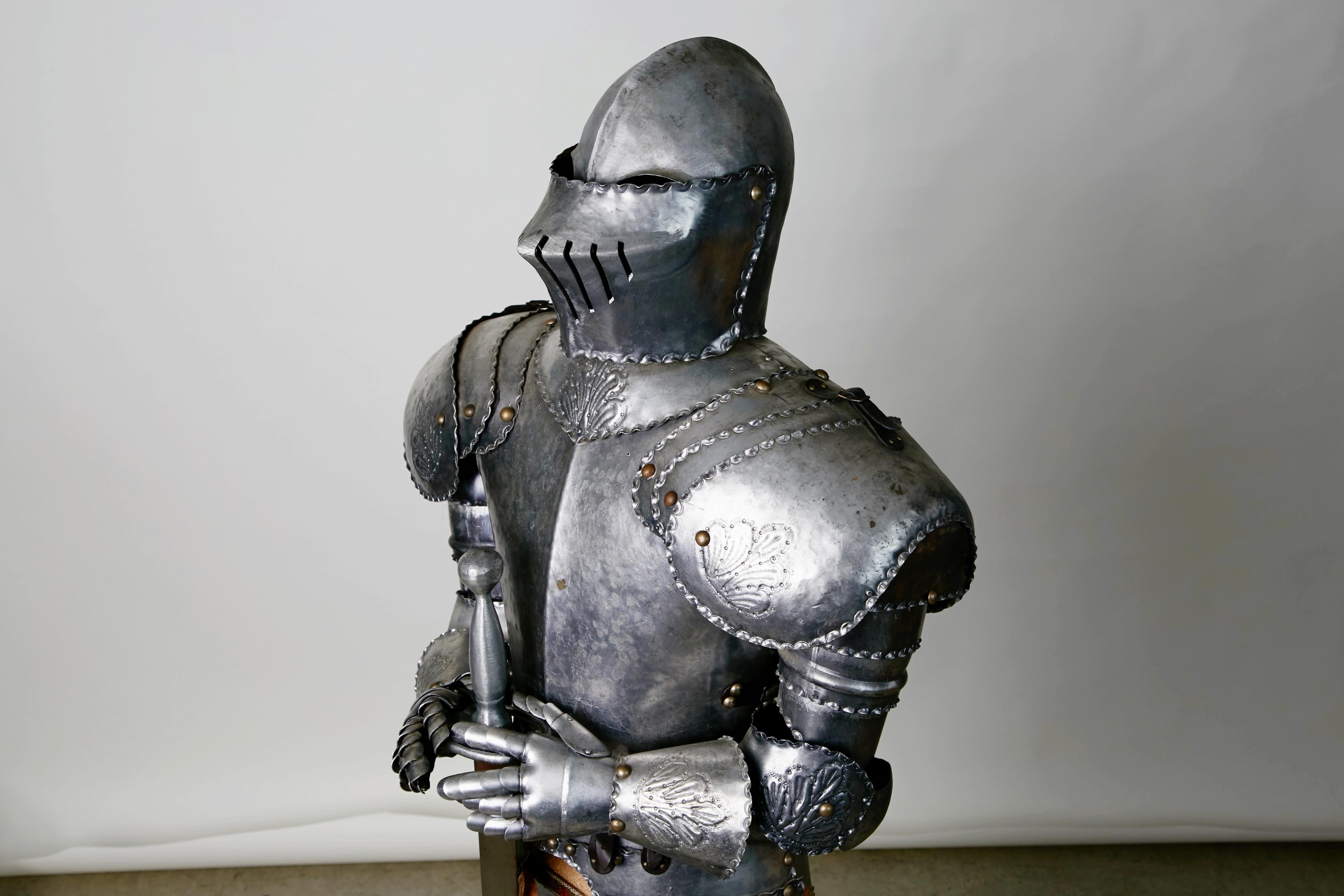 Medieval Style Suit of Fully Articulating Armor with Sword on Display Stand In Good Condition In Los Angeles, CA